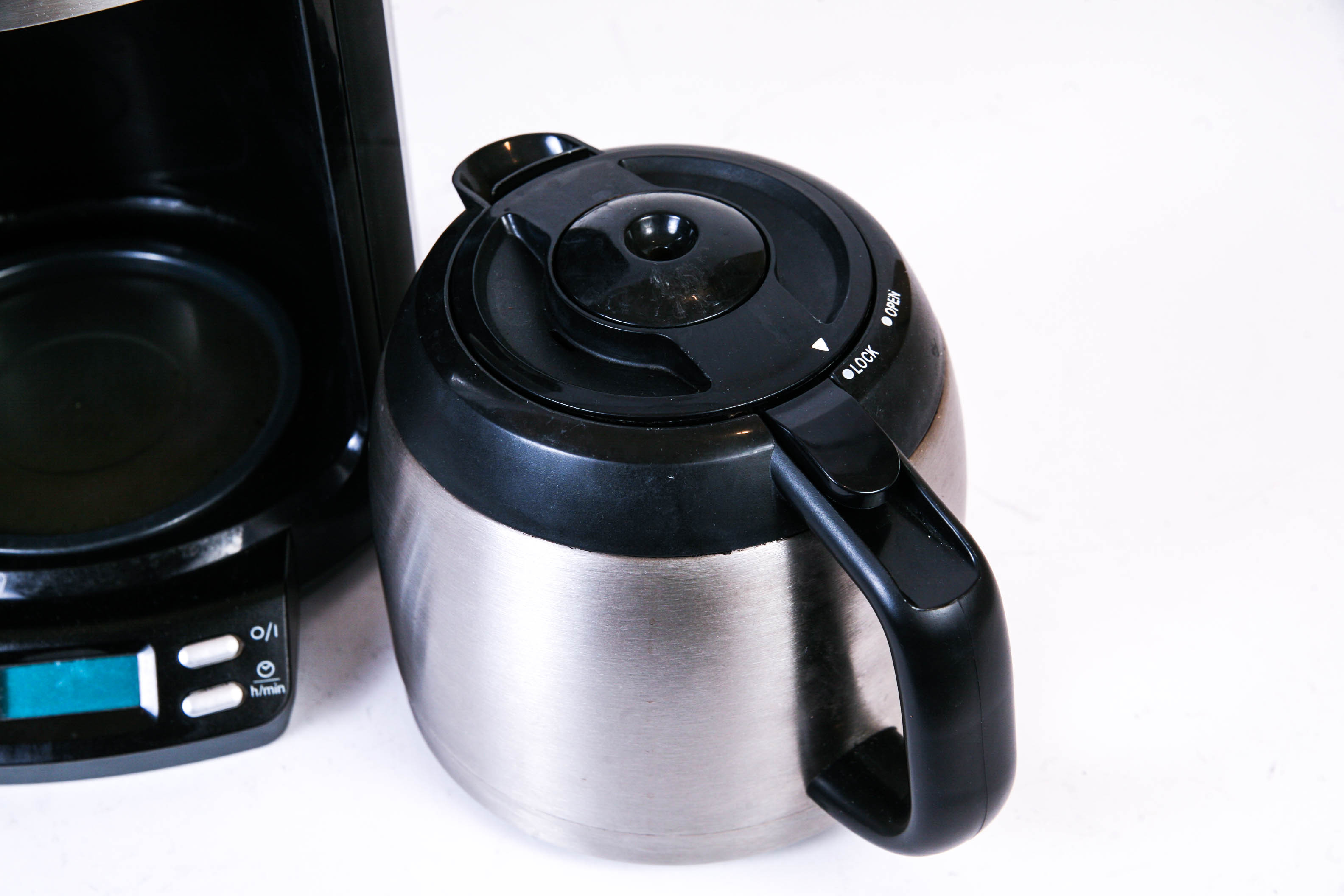 Assortment of Kitchen Items Including Safco Metal Trash Can and Krups Coffee Maker