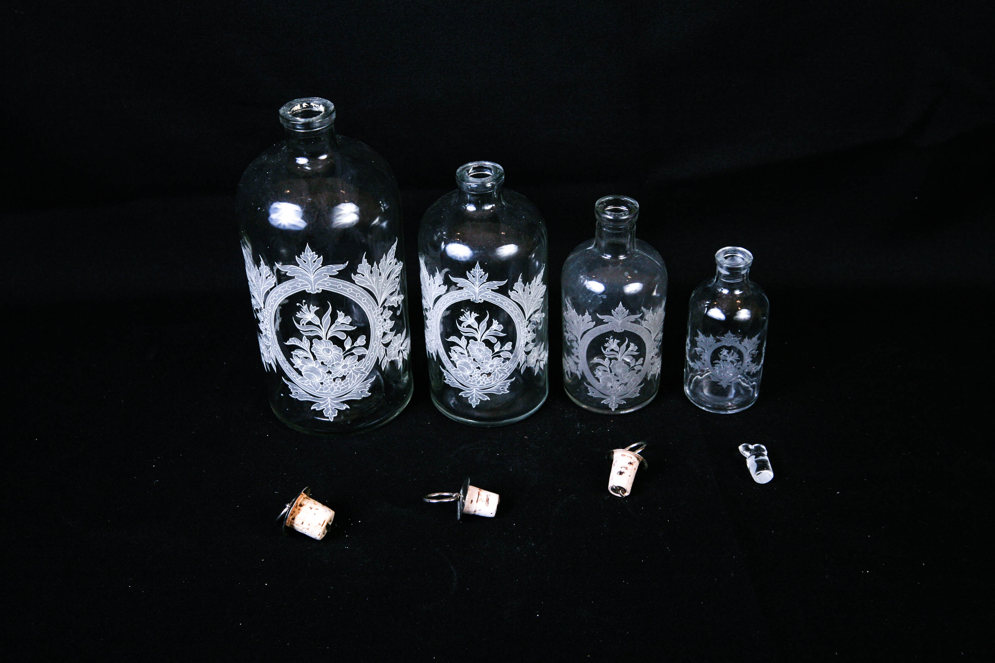 Set of Four Decorative Decanters