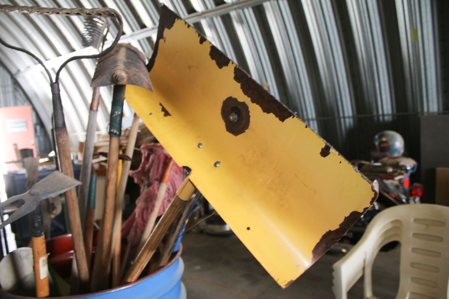 Barrel of Vintage Yard Tools