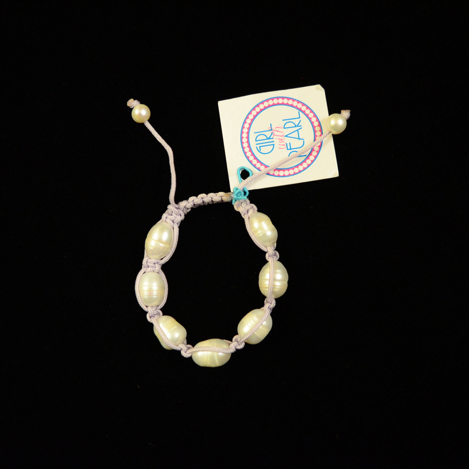 White Pearl and Cord Bracelets