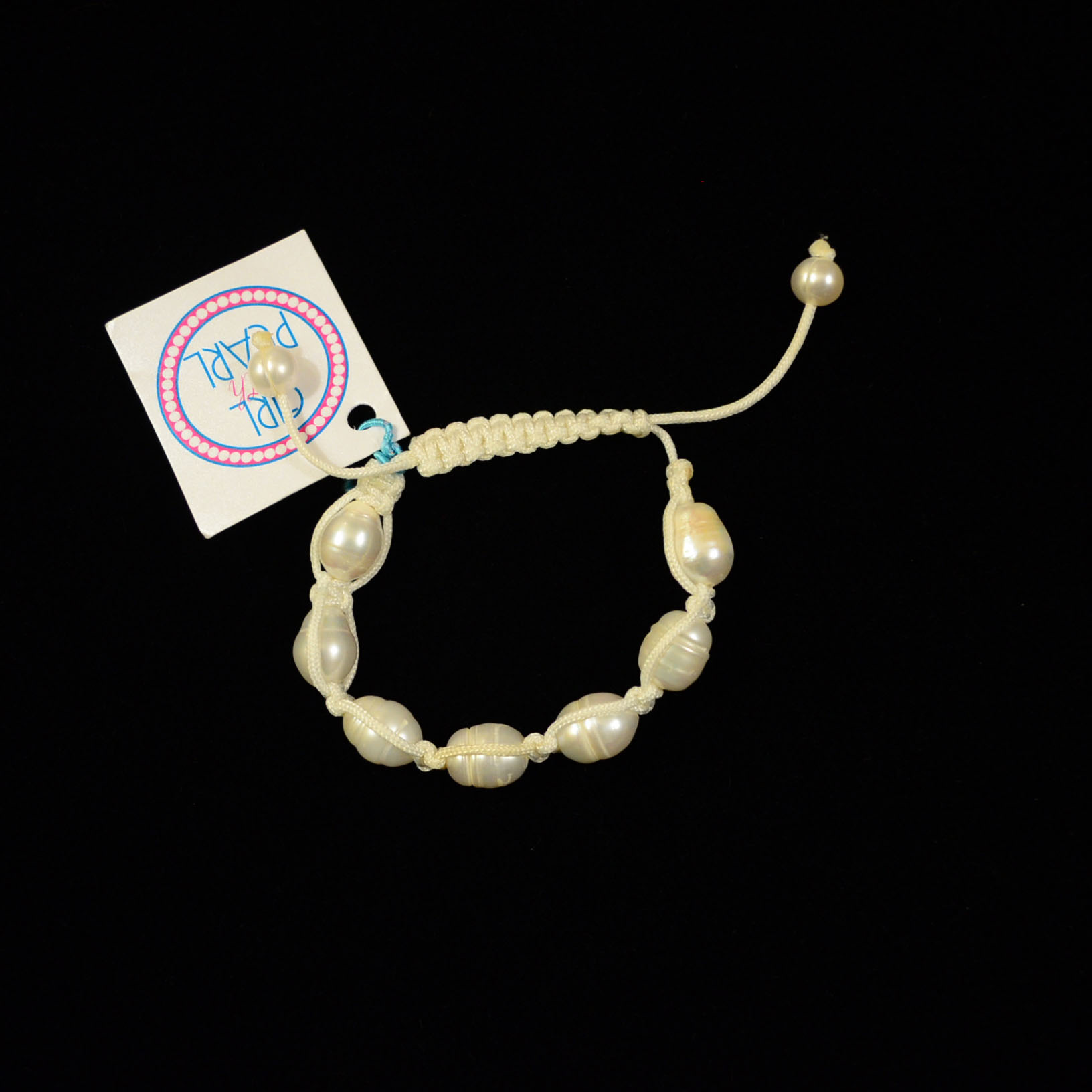 White Pearl and Cord Bracelets