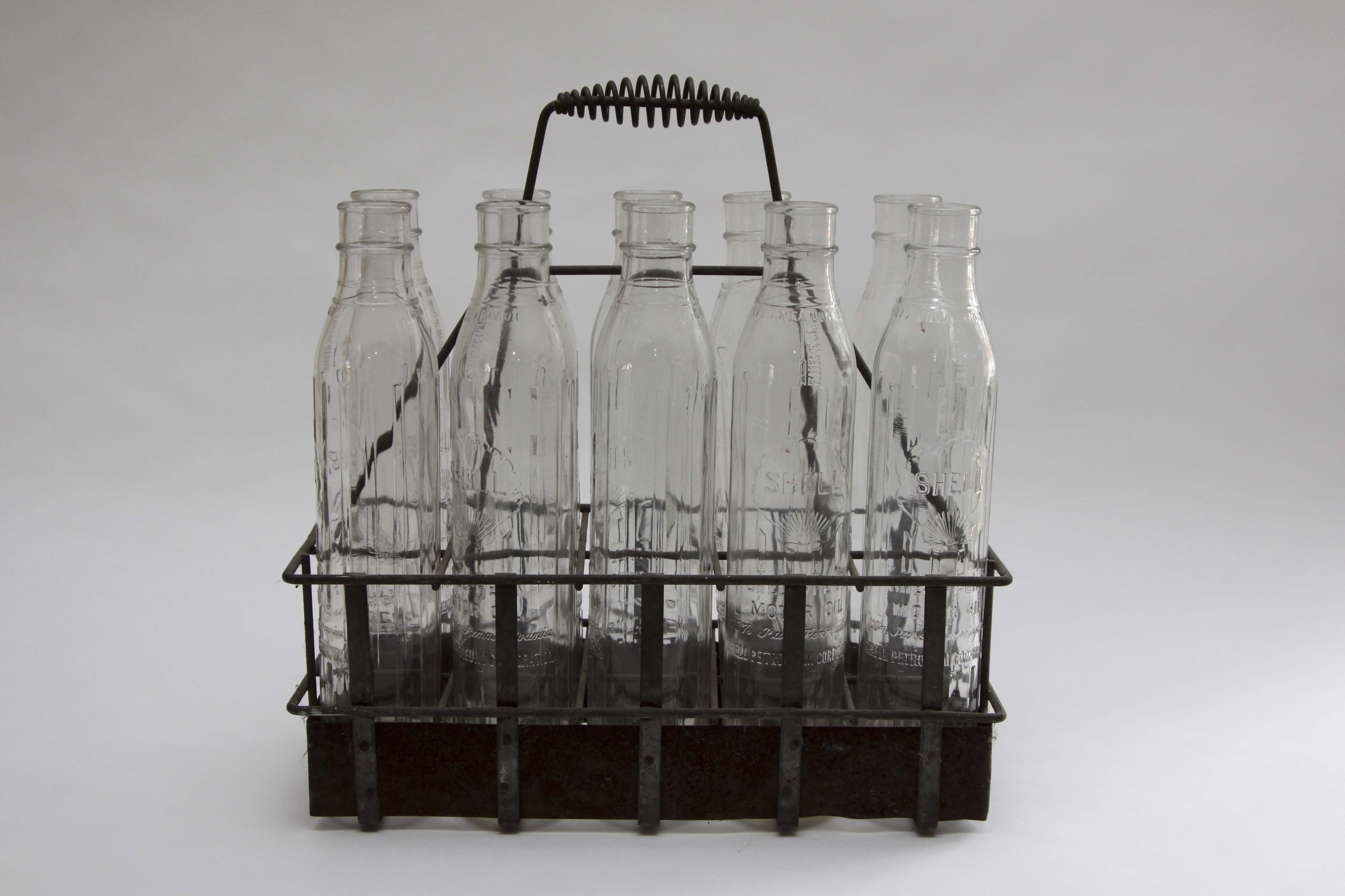 Ten Vintage Shell-Penn Glass Motor Oil Bottles With Metal Carrier