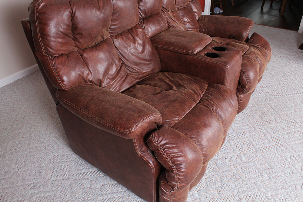 Brown Overstuffed Double Recliner with Center Console