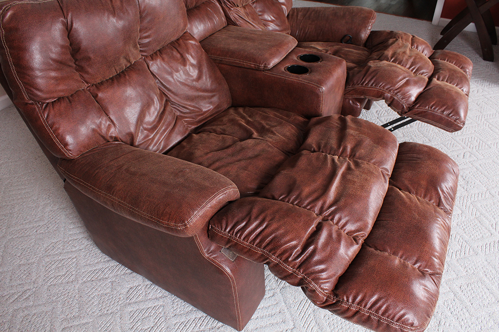 Brown Overstuffed Double Recliner with Center Console