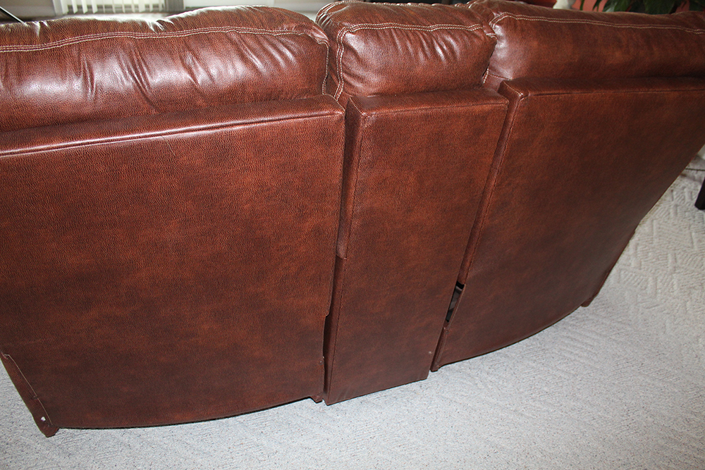 Brown Overstuffed Double Recliner with Center Console