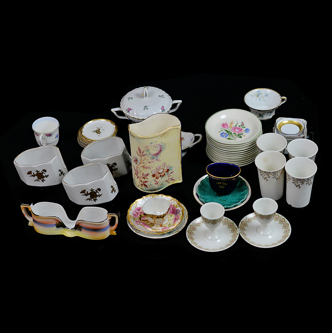 Various Teacups, Saucers, and Serving Pieces