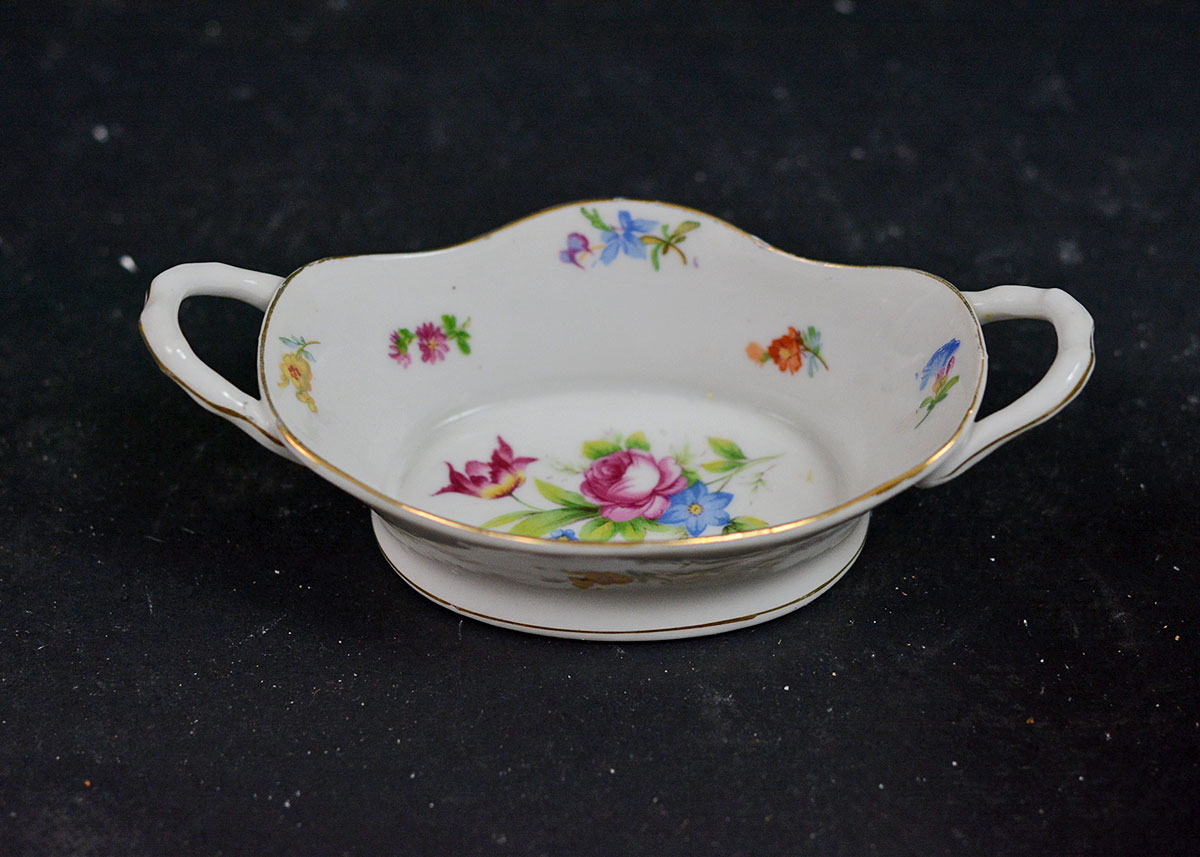 Various Teacups, Saucers, and Serving Pieces