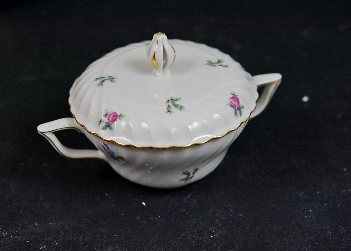 Various Teacups, Saucers, and Serving Pieces