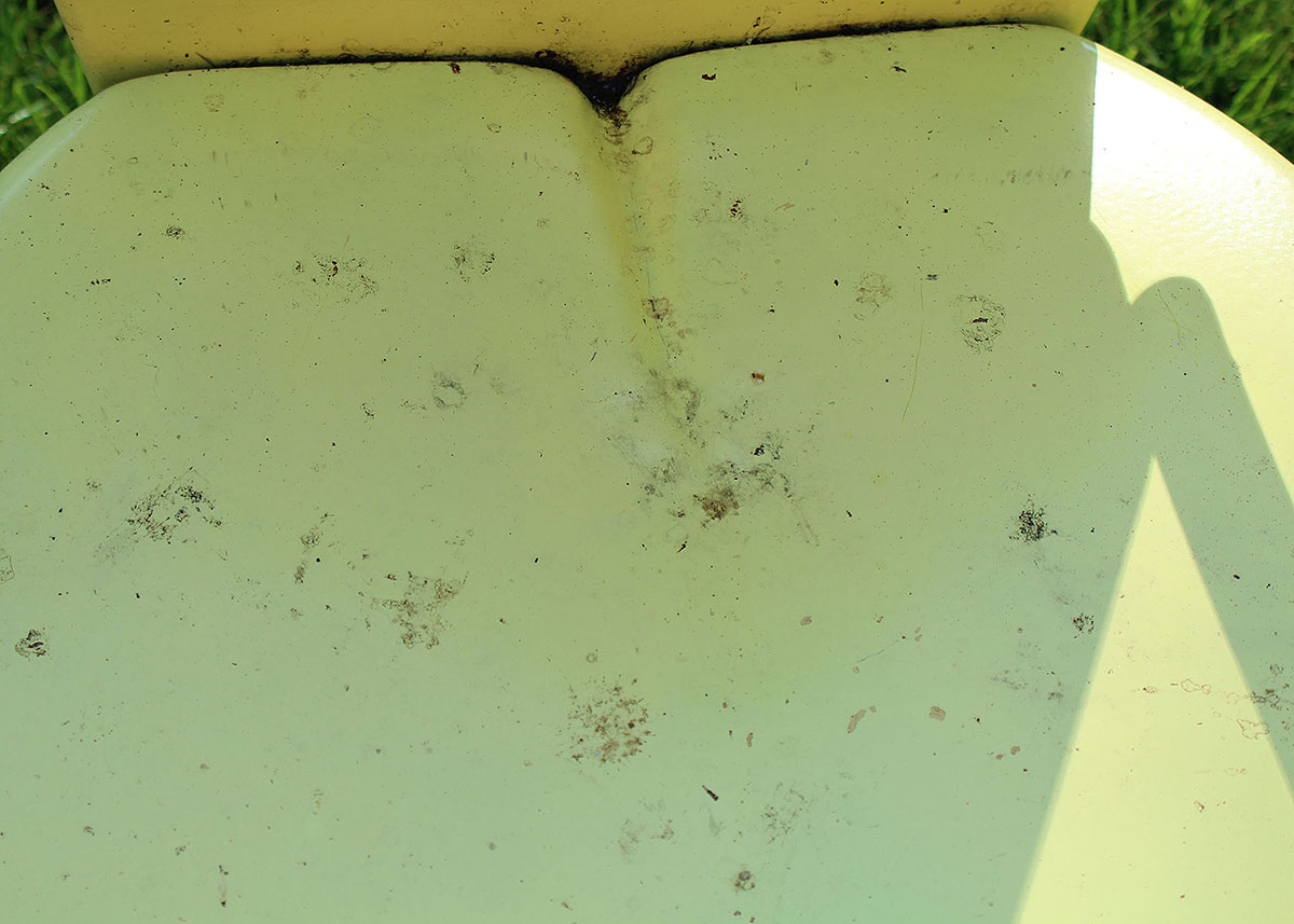 Three Vintage Yellow Metal Patio Chairs