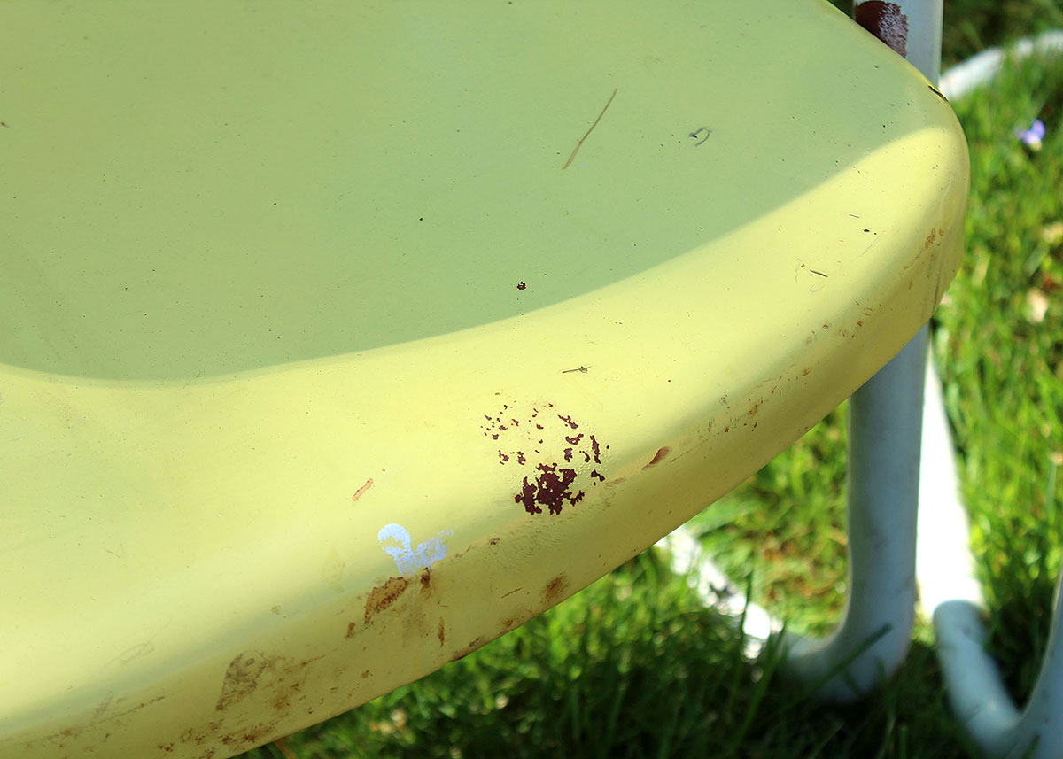 Three Vintage Yellow Metal Patio Chairs