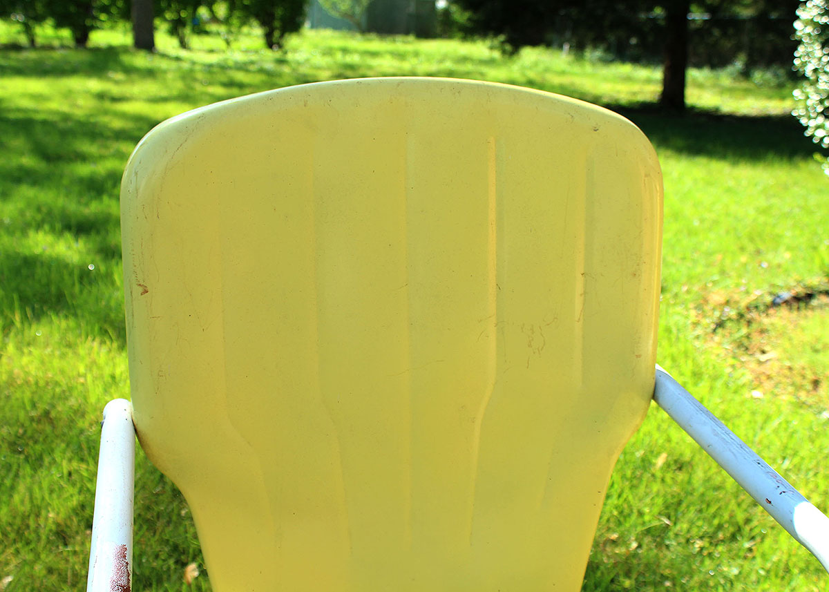 Three Vintage Yellow Metal Patio Chairs