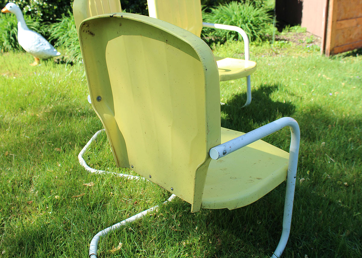Three Vintage Yellow Metal Patio Chairs