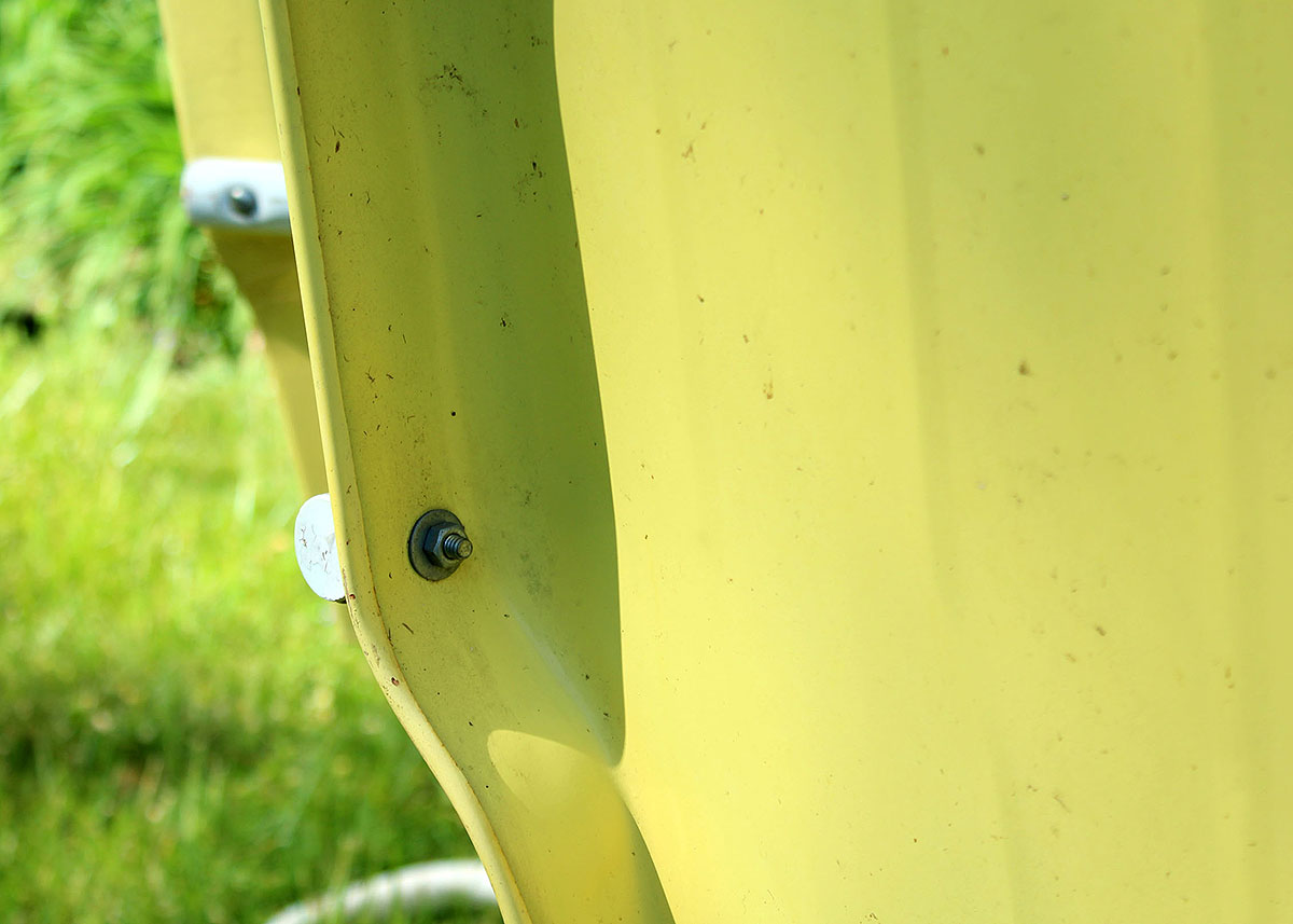 Three Vintage Yellow Metal Patio Chairs