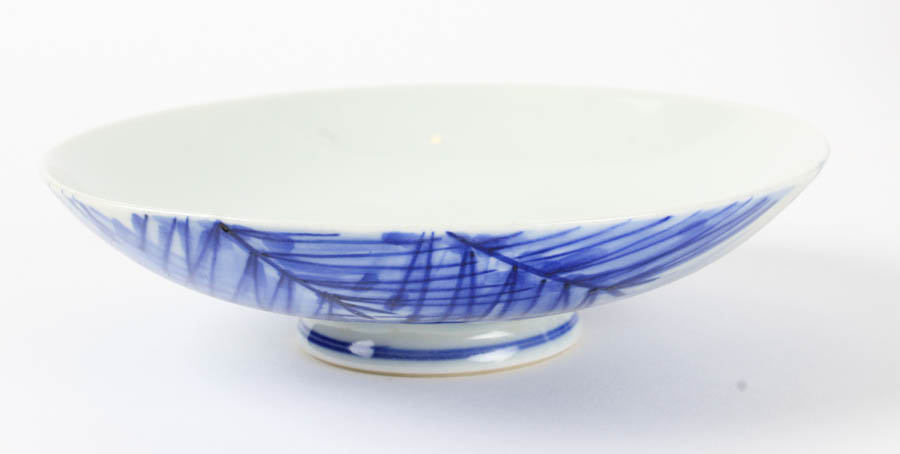 Assortment of Blue and White Ceramic Pieces