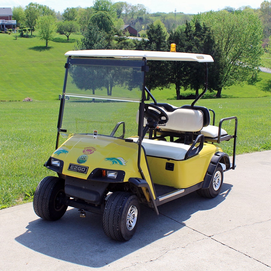 E-Z-GO Electric Utility Golf Cart in Bright Yellow