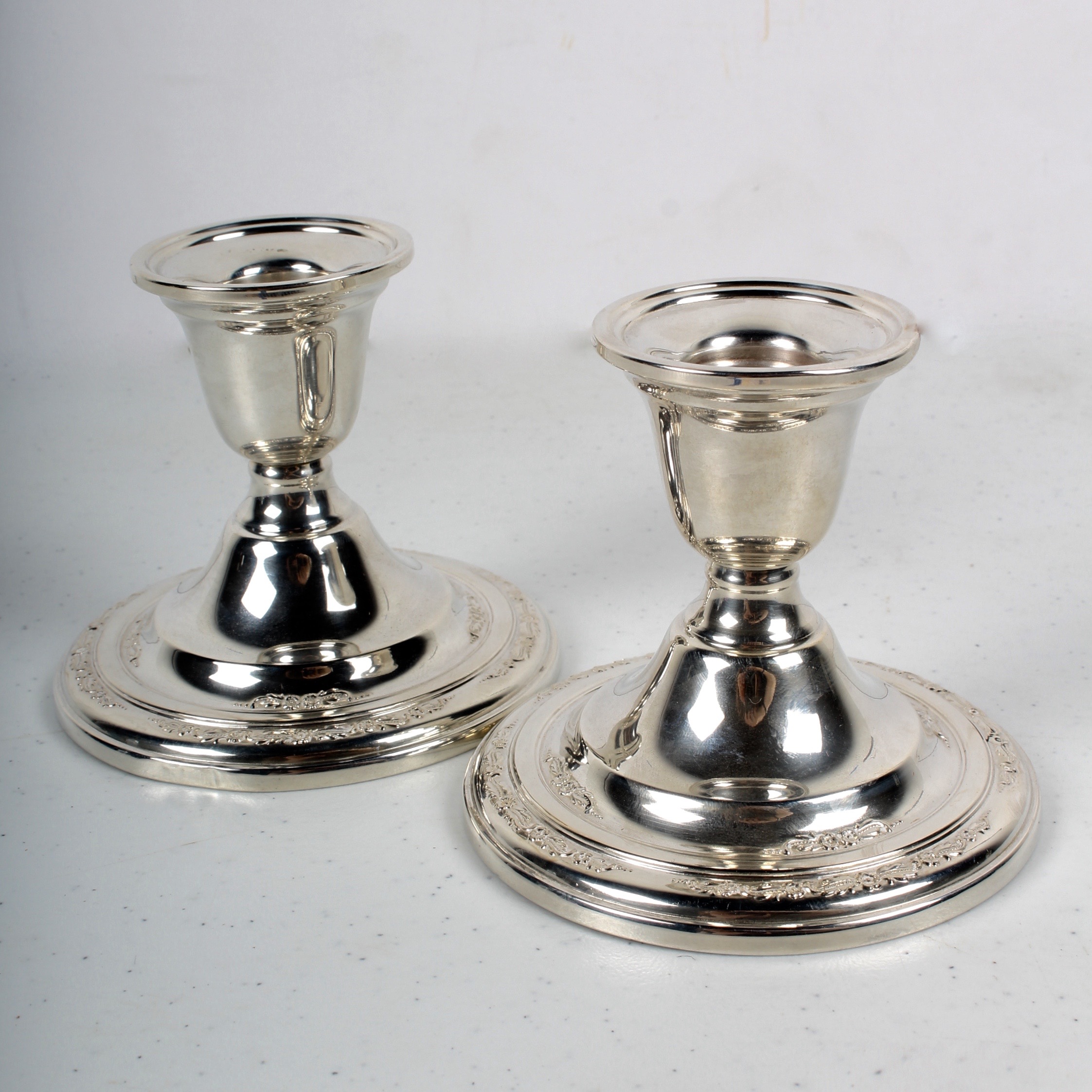 Pair of International Sterling "Courtship" Weighted Sterling Candlesticks