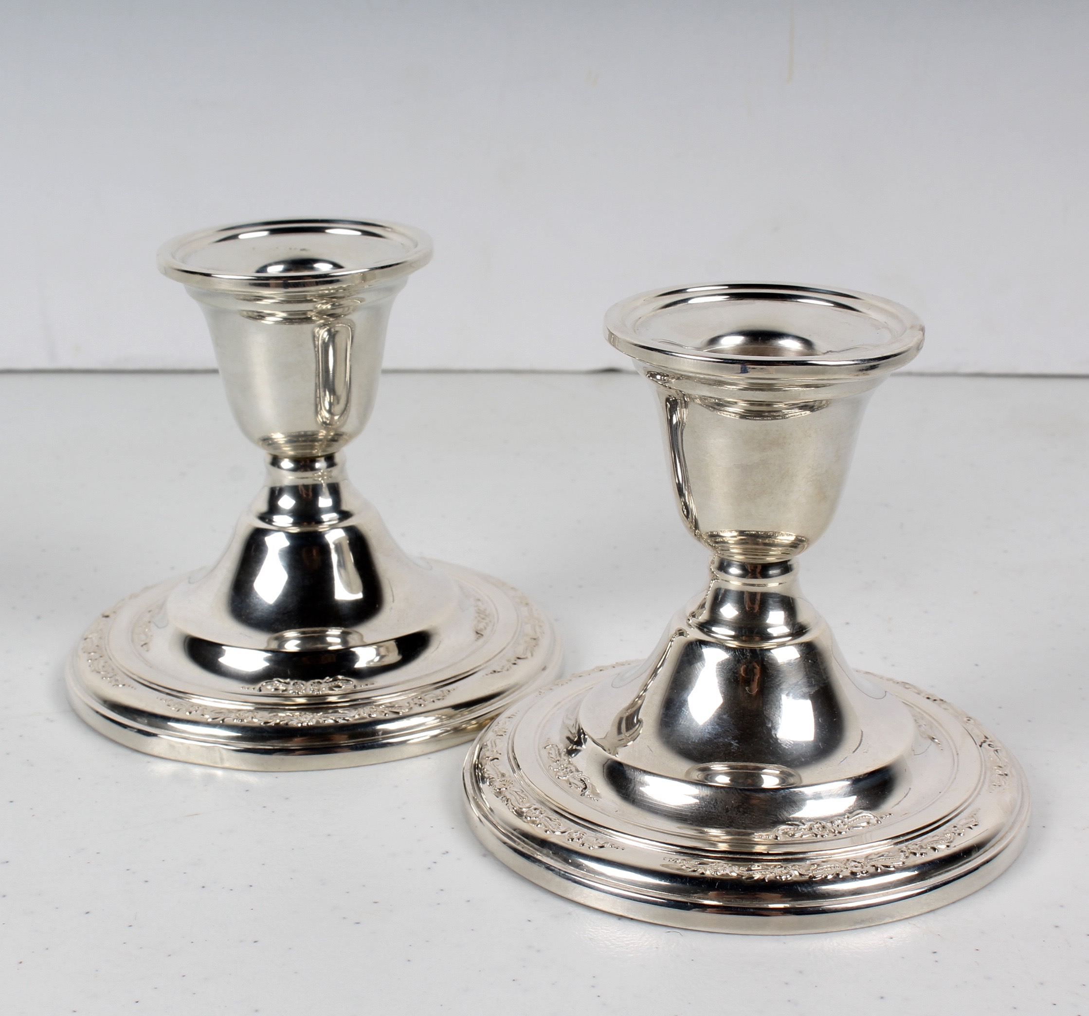 Pair of International Sterling "Courtship" Weighted Sterling Candlesticks