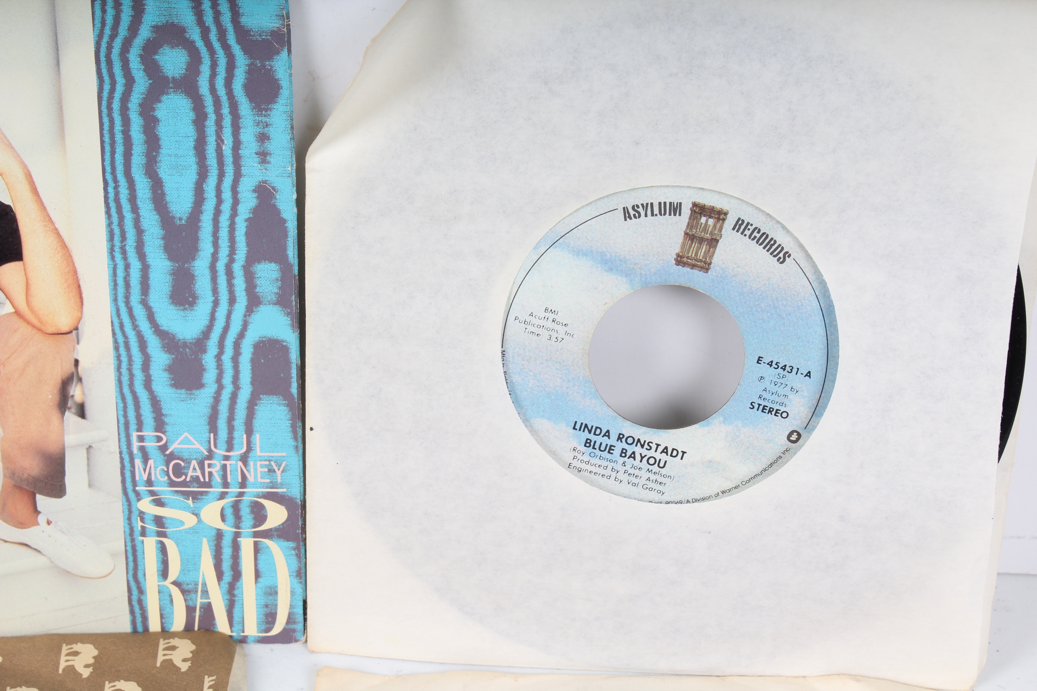 Large Collection of Vintage 45 RPM Records Featuring the Beatles