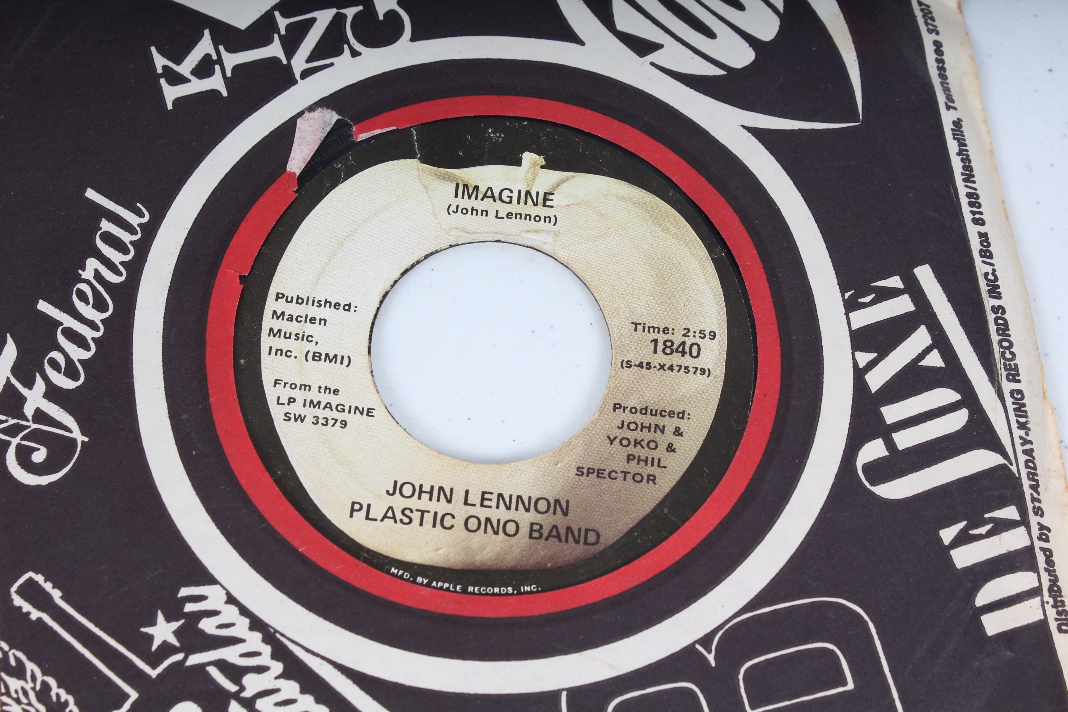 Large Collection of Vintage 45 RPM Records Featuring the Beatles