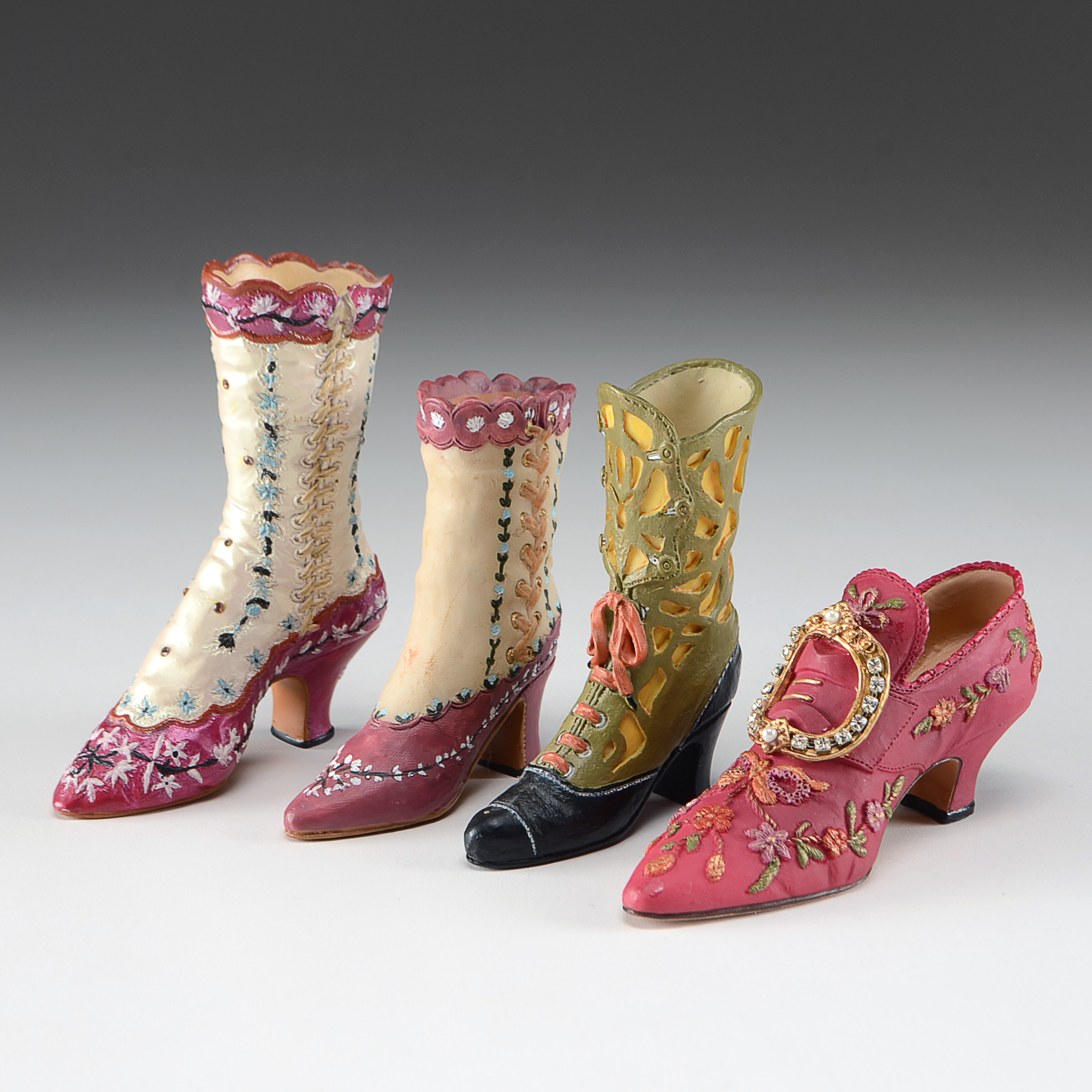 Collection of Four Miniature Resin Shoe Figurines Including Nostalgia