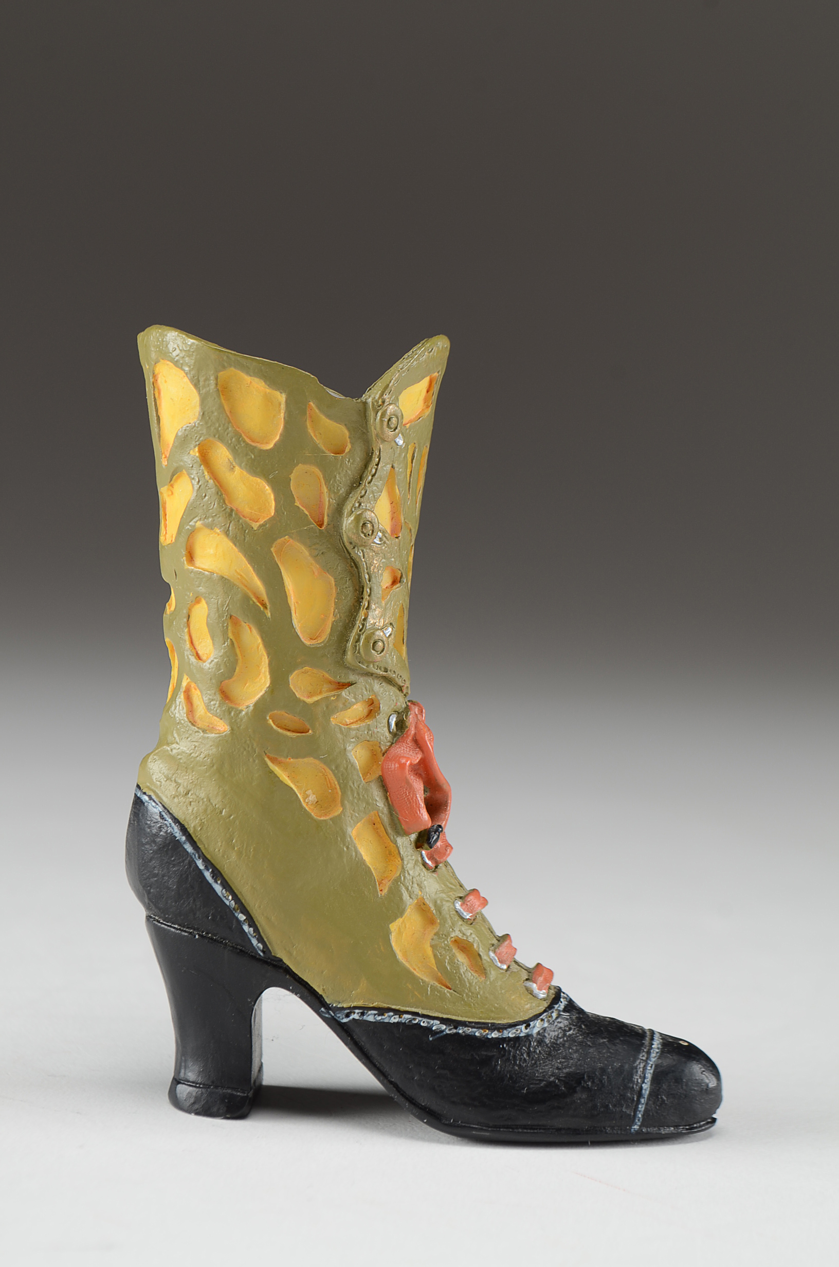 Collection of Four Miniature Resin Shoe Figurines Including Nostalgia