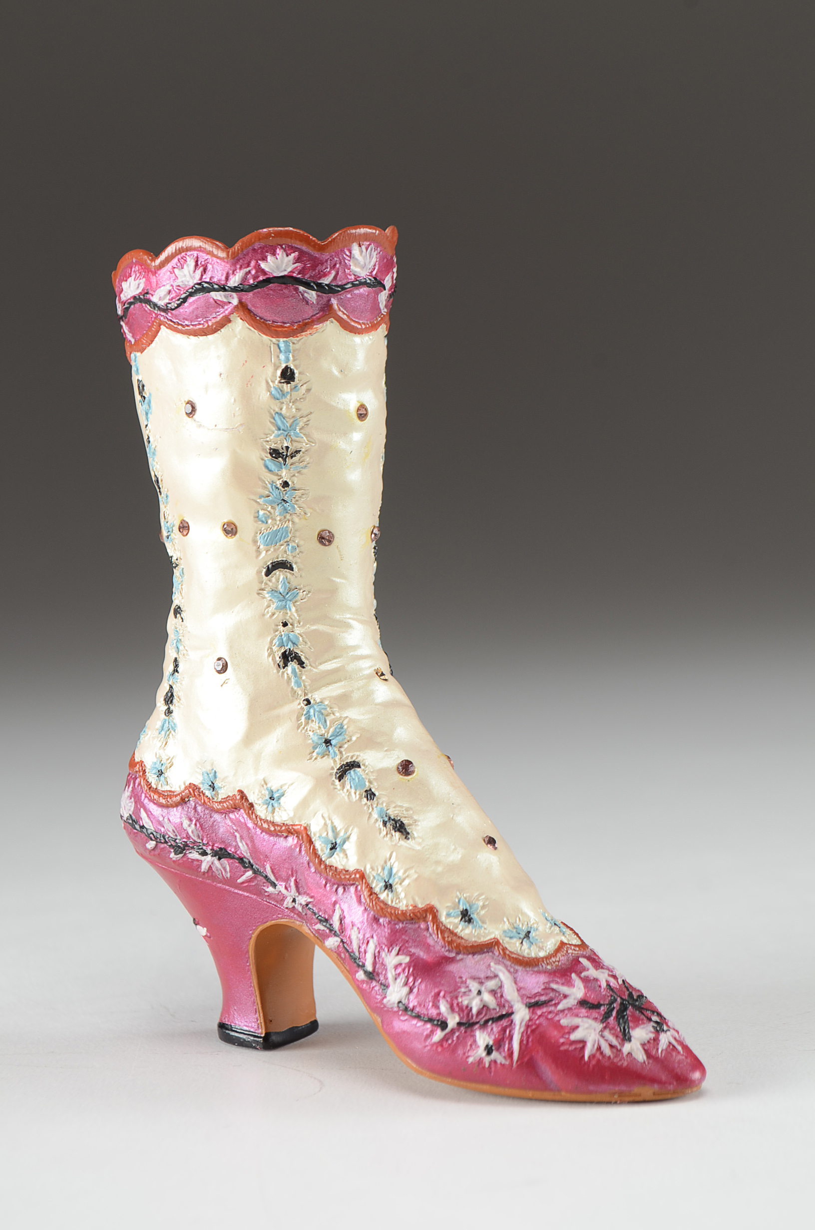 Collection of Four Miniature Resin Shoe Figurines Including Nostalgia