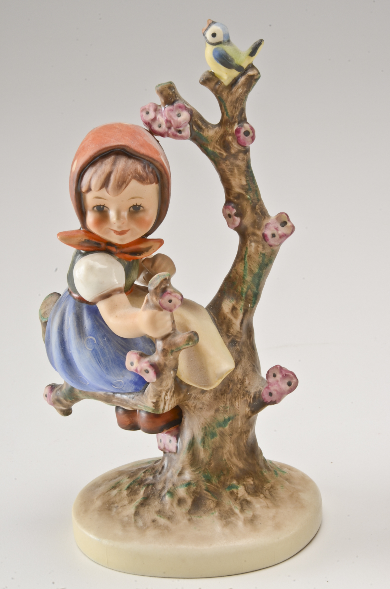 Hummel "Apple Tree Boy" and "Apple Tree Girl" Figurines