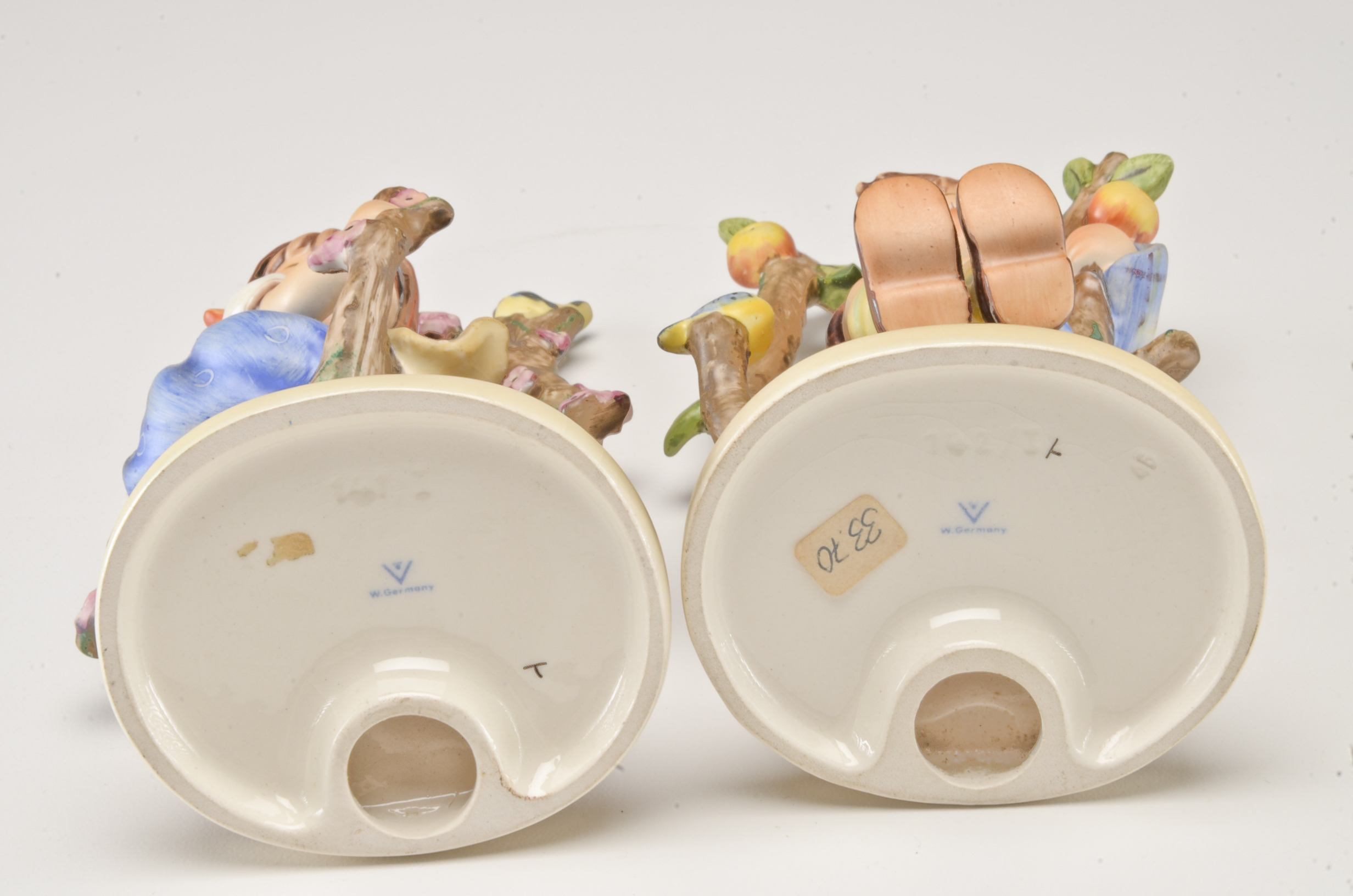 Hummel "Apple Tree Boy" and "Apple Tree Girl" Figurines