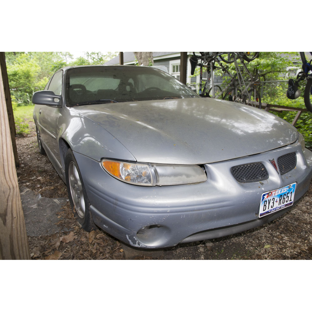 Silver Pontiac Supercharged Grand Prix