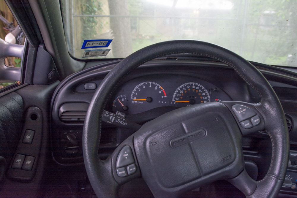 Silver Pontiac Supercharged Grand Prix