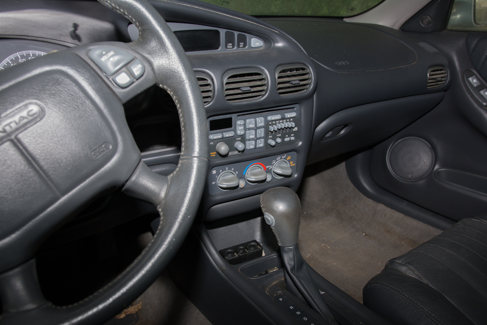 Silver Pontiac Supercharged Grand Prix