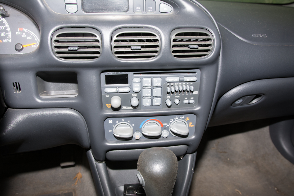 Silver Pontiac Supercharged Grand Prix