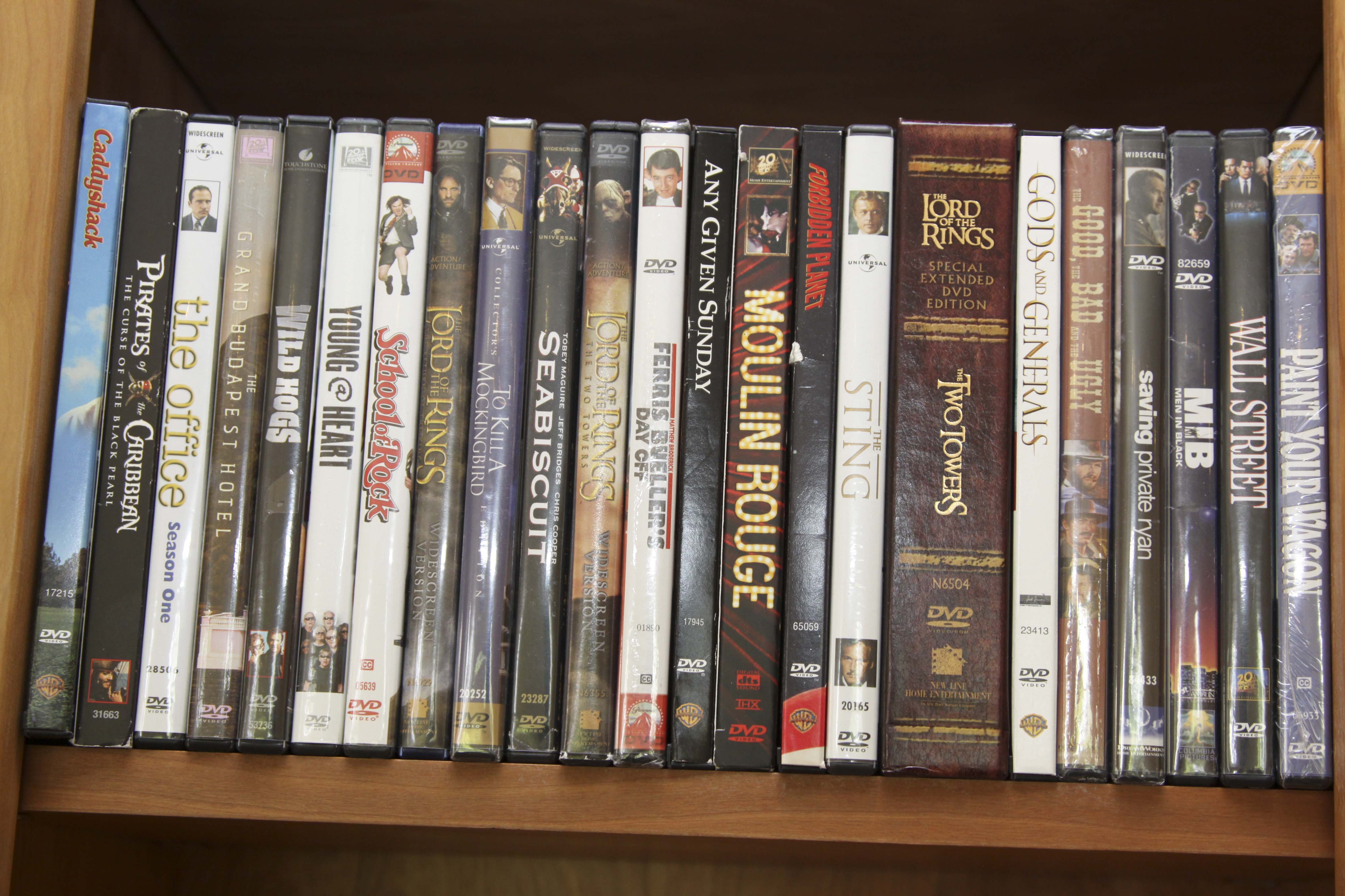 Insignia Flat Screen Television with Sony Blue Ray DVD Player and Collection of DVDs