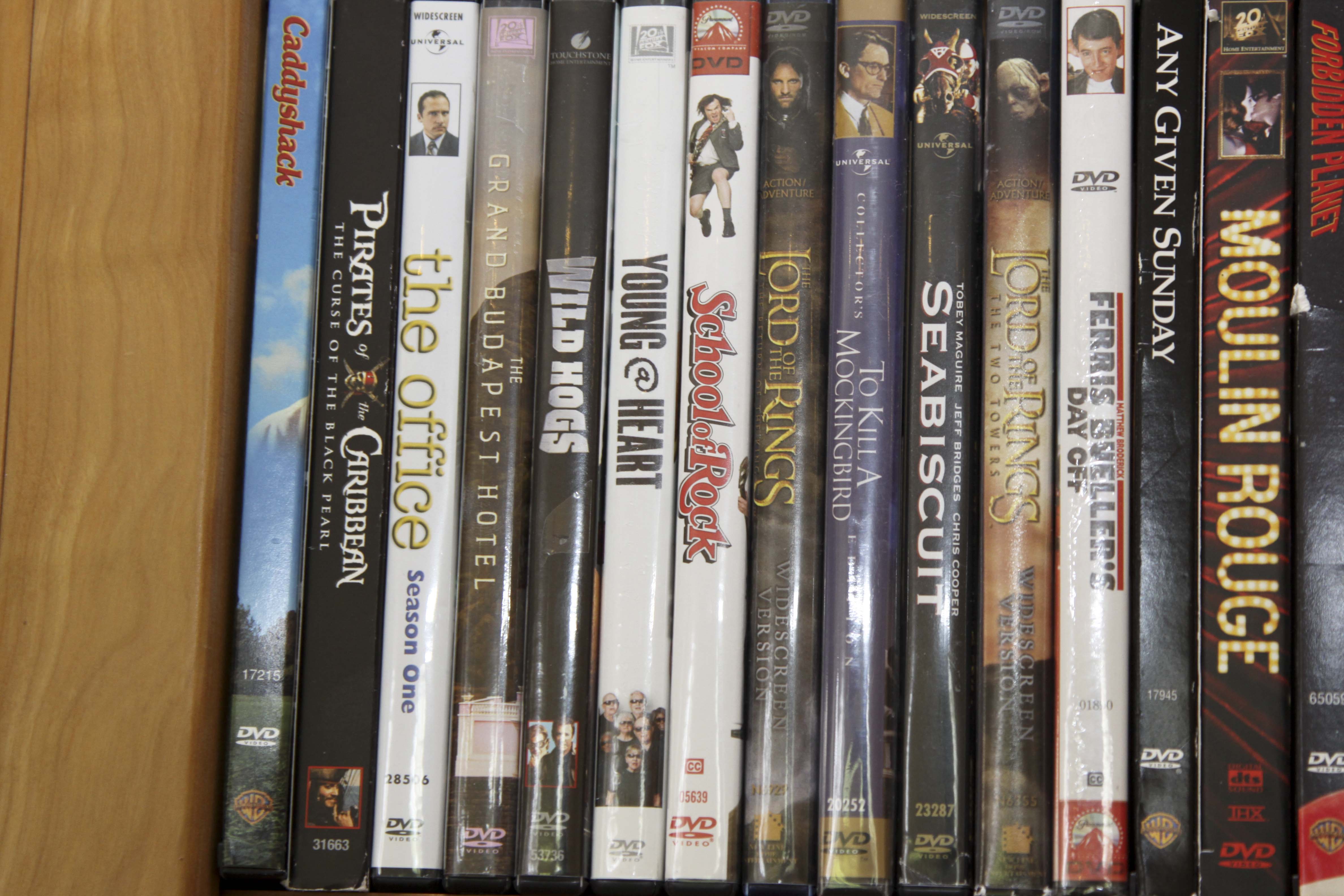 Insignia Flat Screen Television with Sony Blue Ray DVD Player and Collection of DVDs