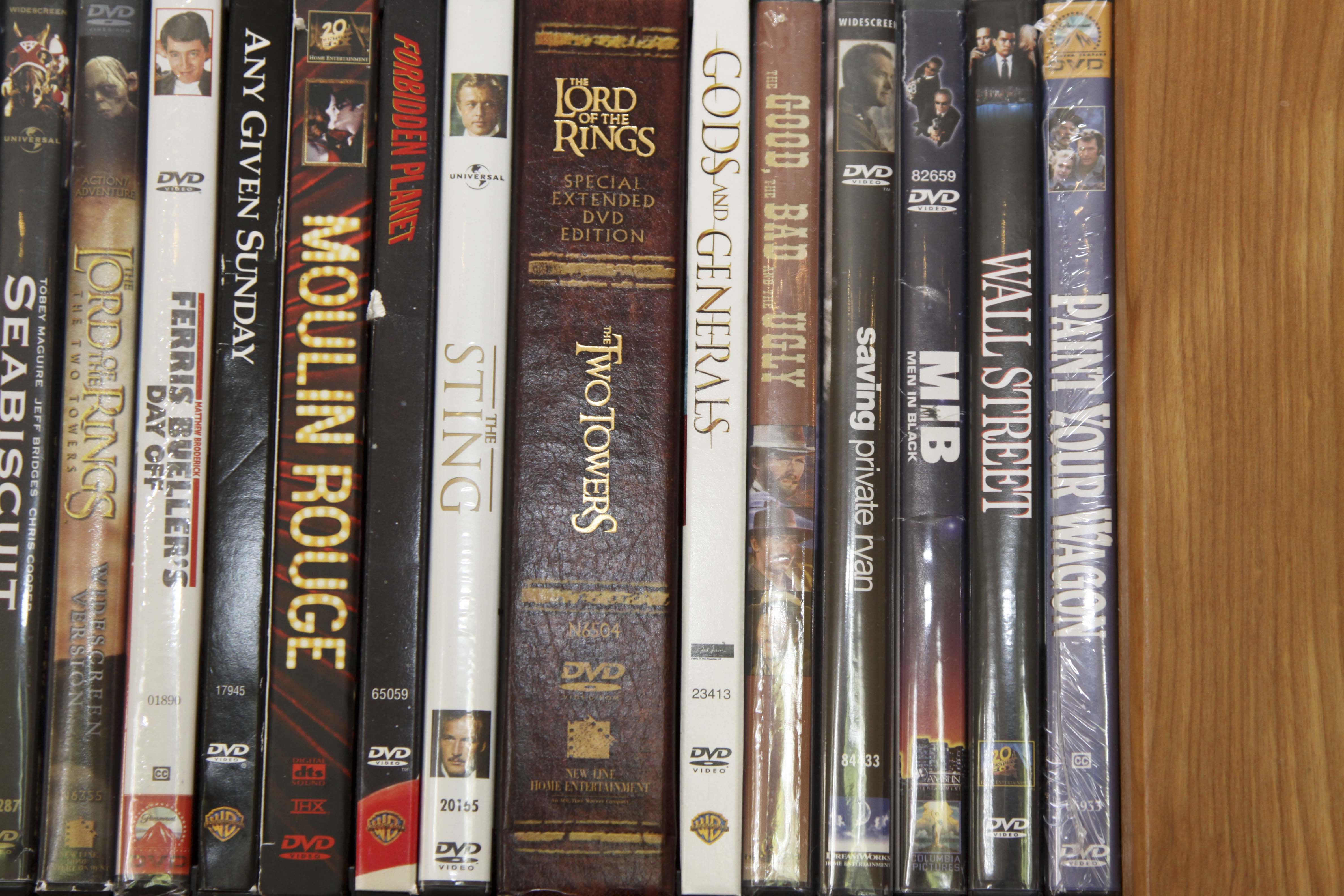 Insignia Flat Screen Television with Sony Blue Ray DVD Player and Collection of DVDs