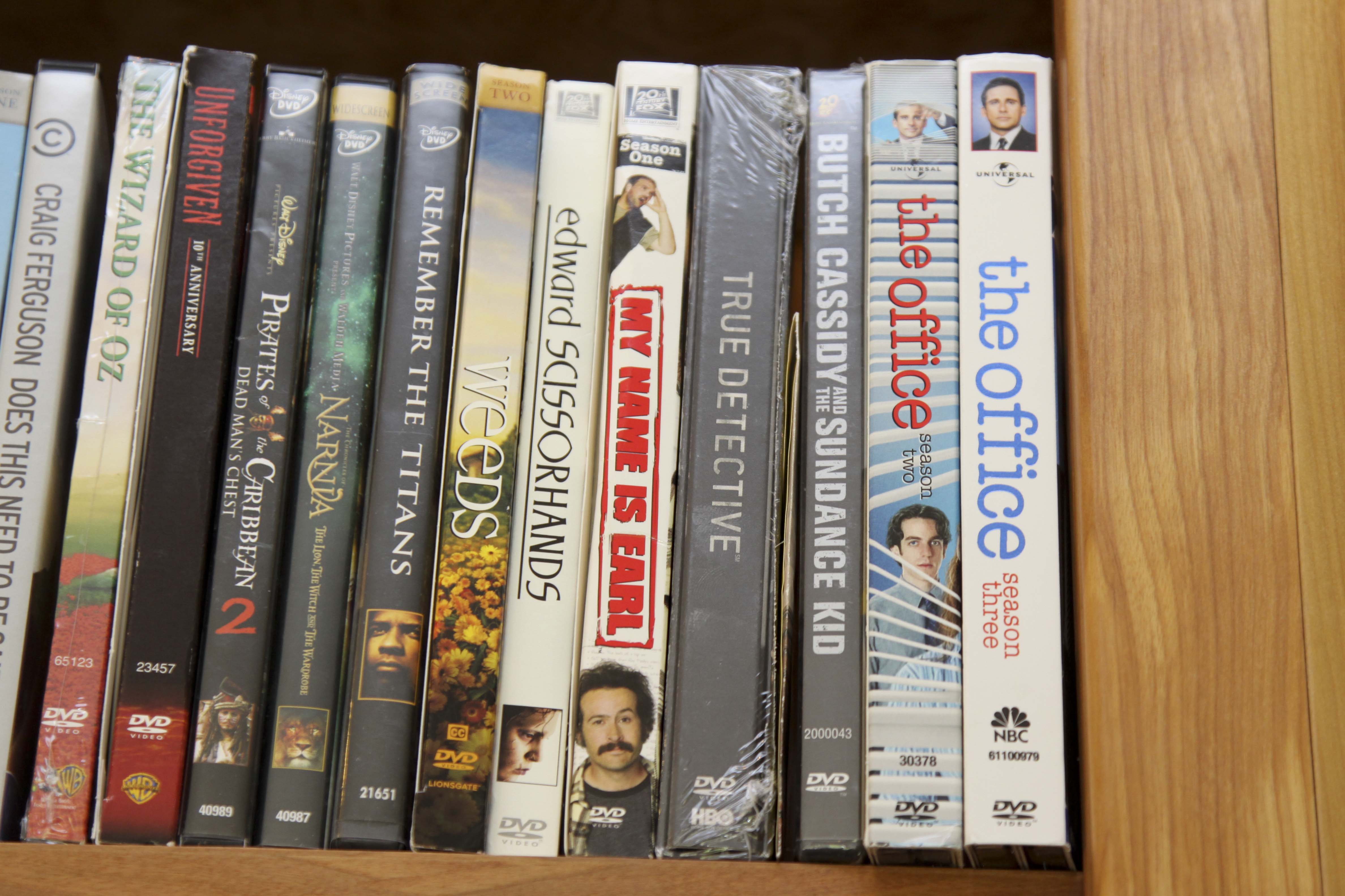 Insignia Flat Screen Television with Sony Blue Ray DVD Player and Collection of DVDs