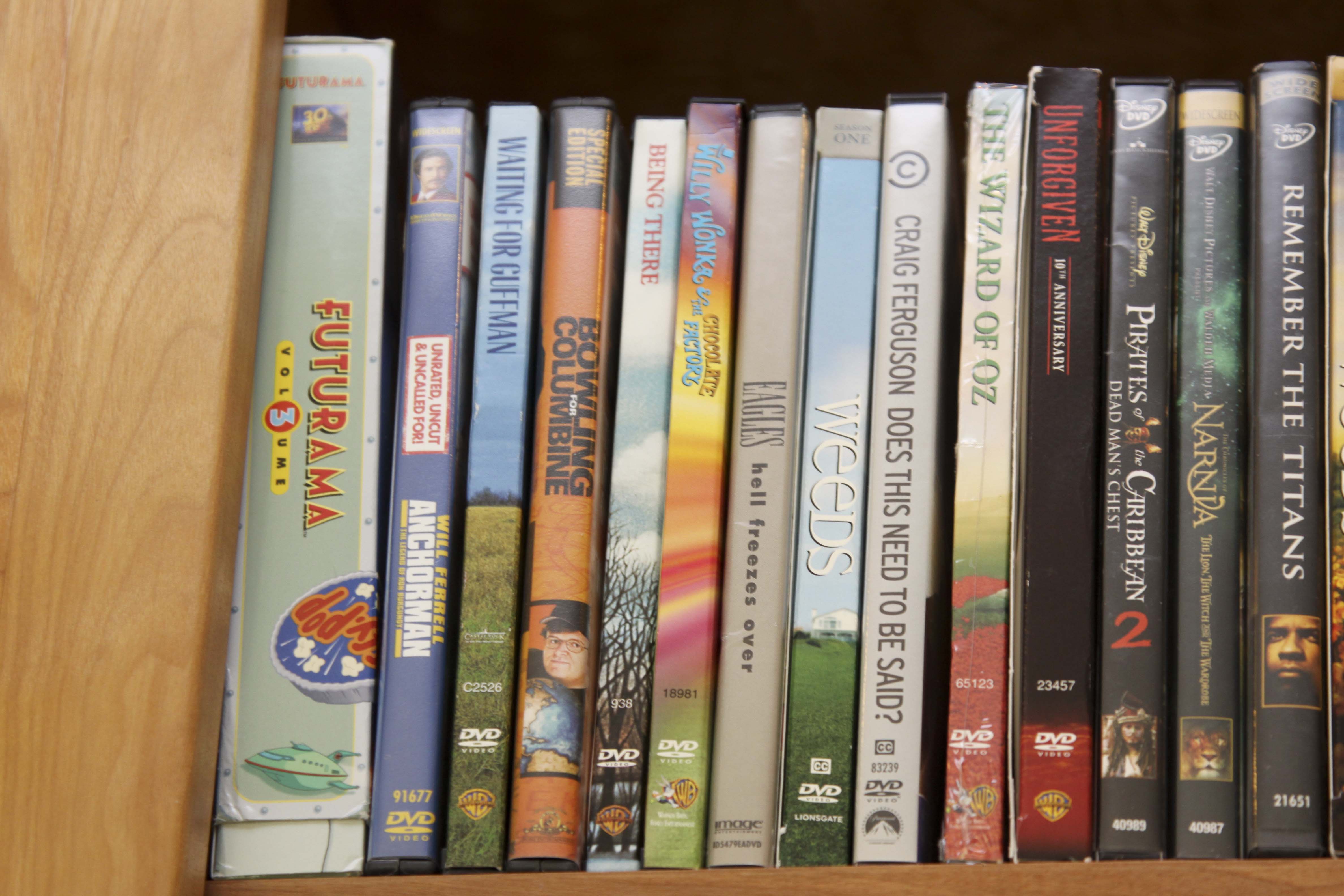 Insignia Flat Screen Television with Sony Blue Ray DVD Player and Collection of DVDs