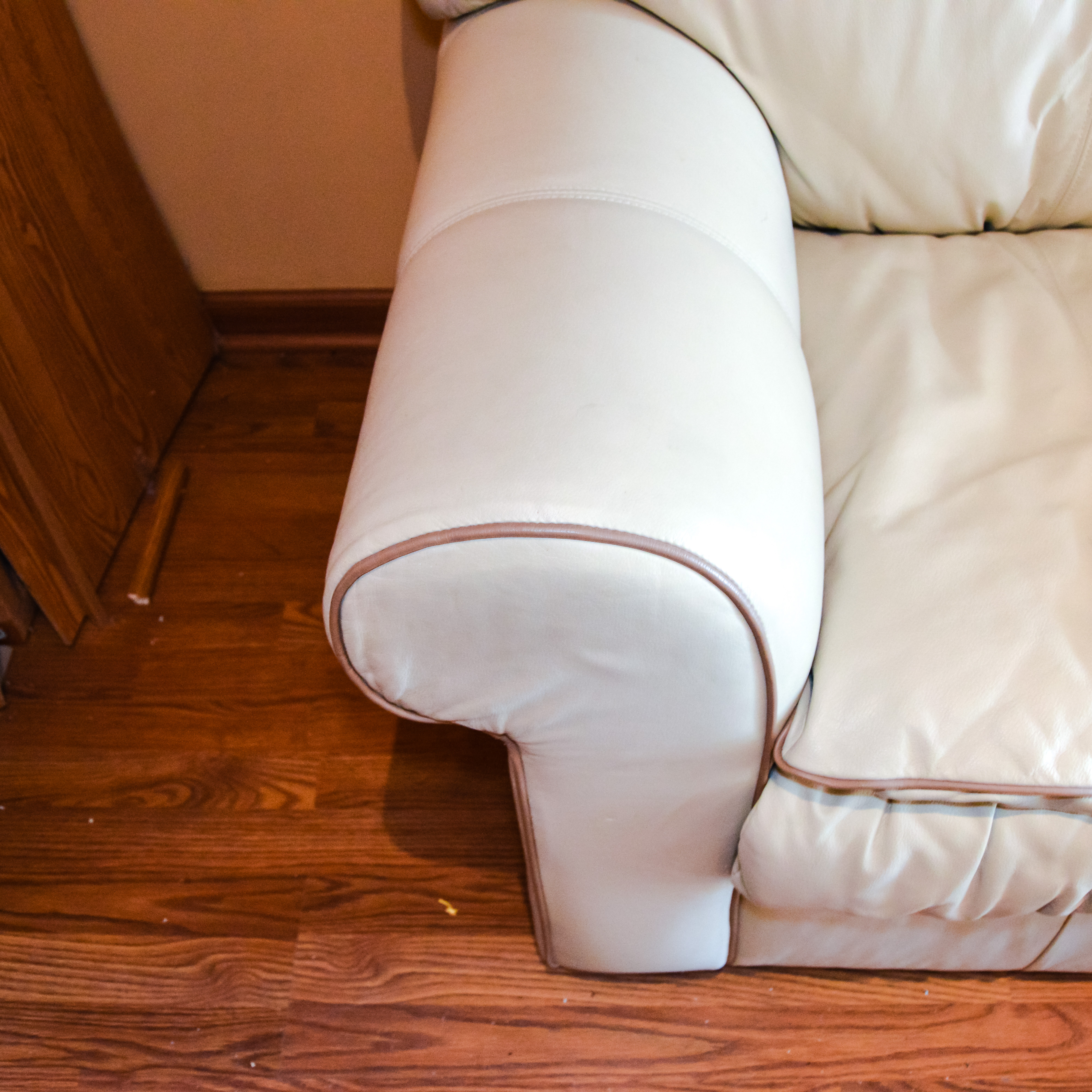 Robinson and Robinson Off White Leather Loveseat