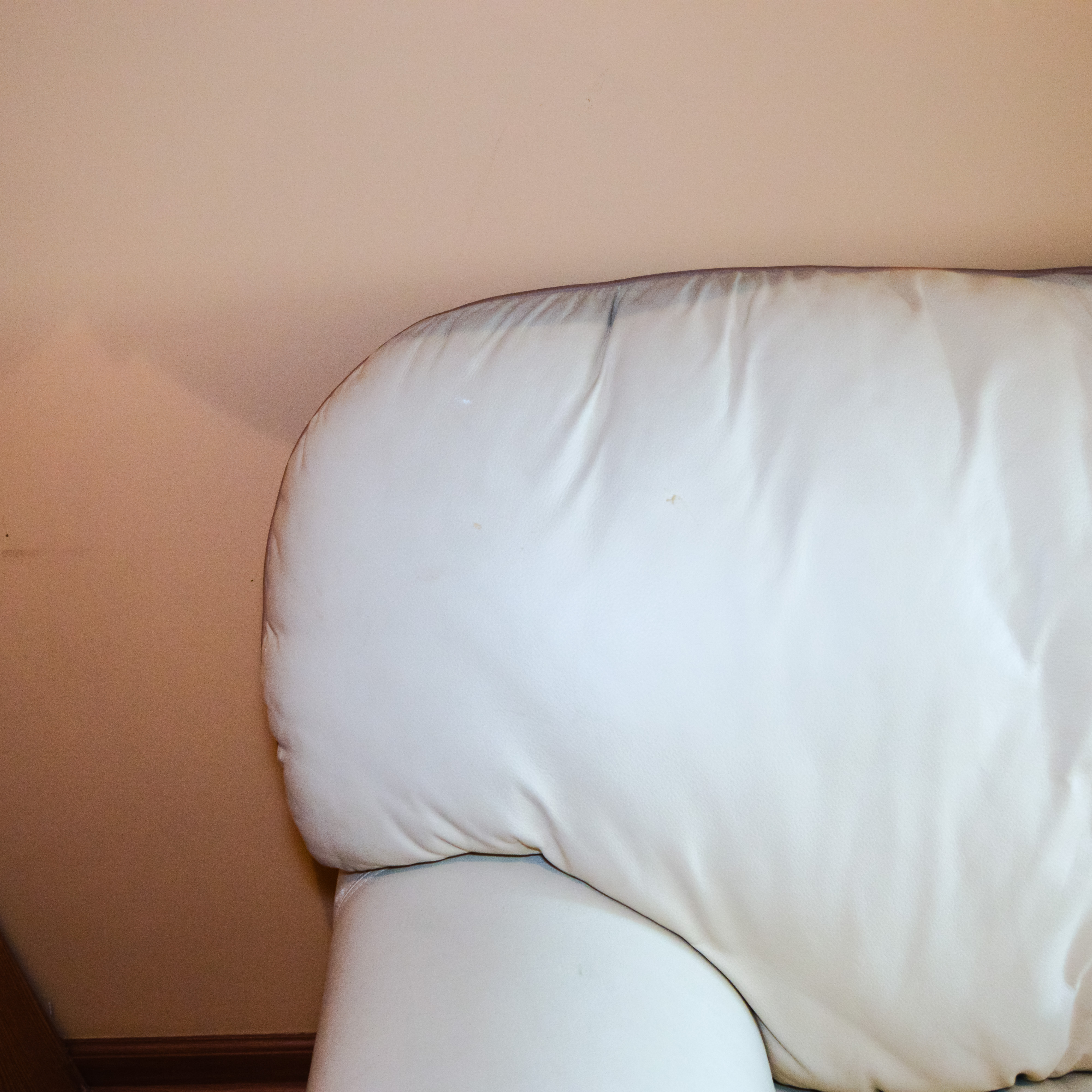 Robinson and Robinson Off White Leather Loveseat