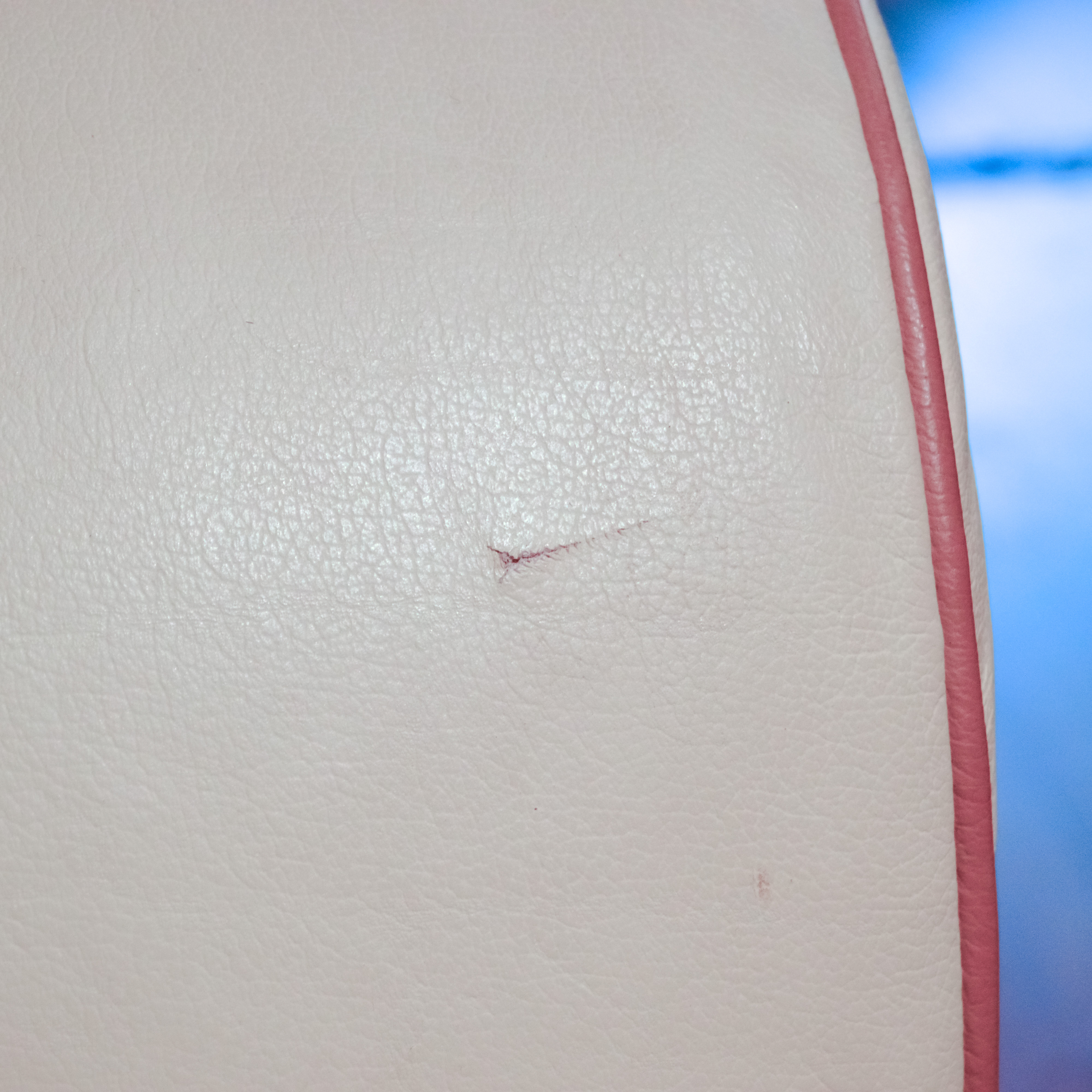 Robinson and Robinson Off White Leather Loveseat