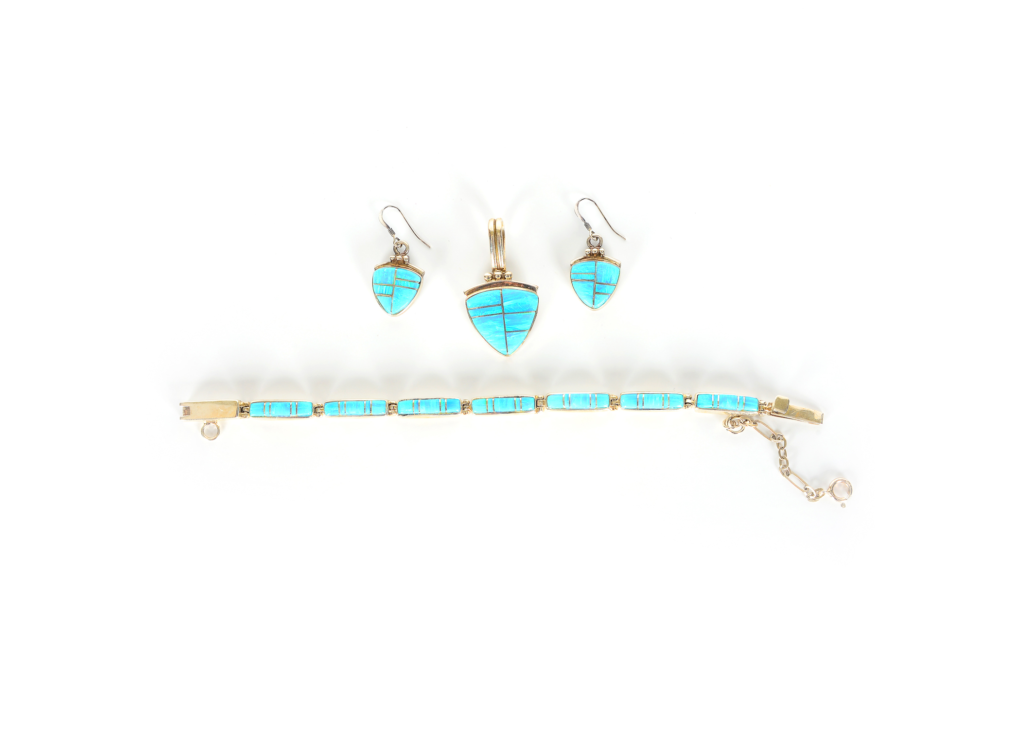 Sterling Silver Earrings, Bracelet, and Pendant