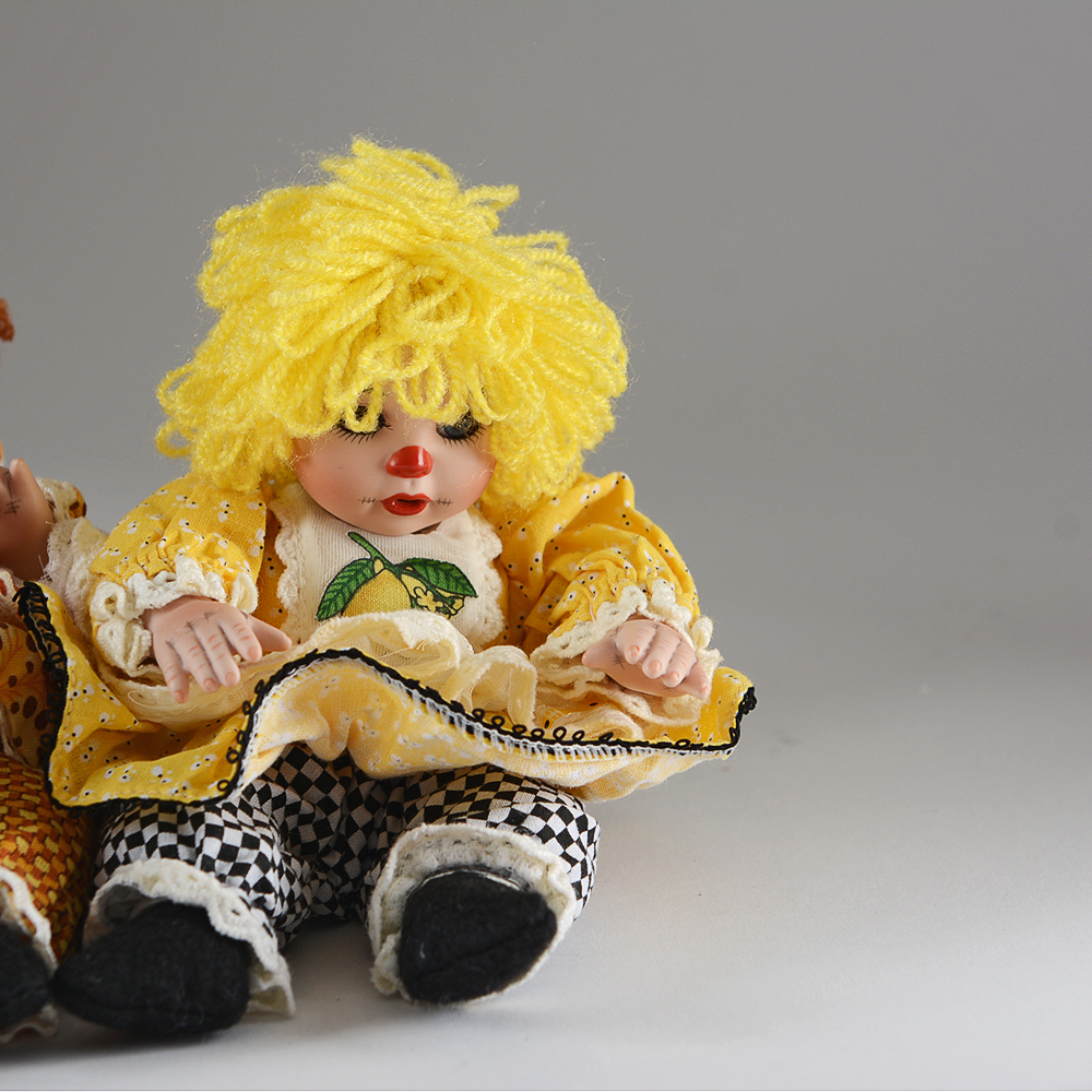 Charisma Brands Porcelain Dolls