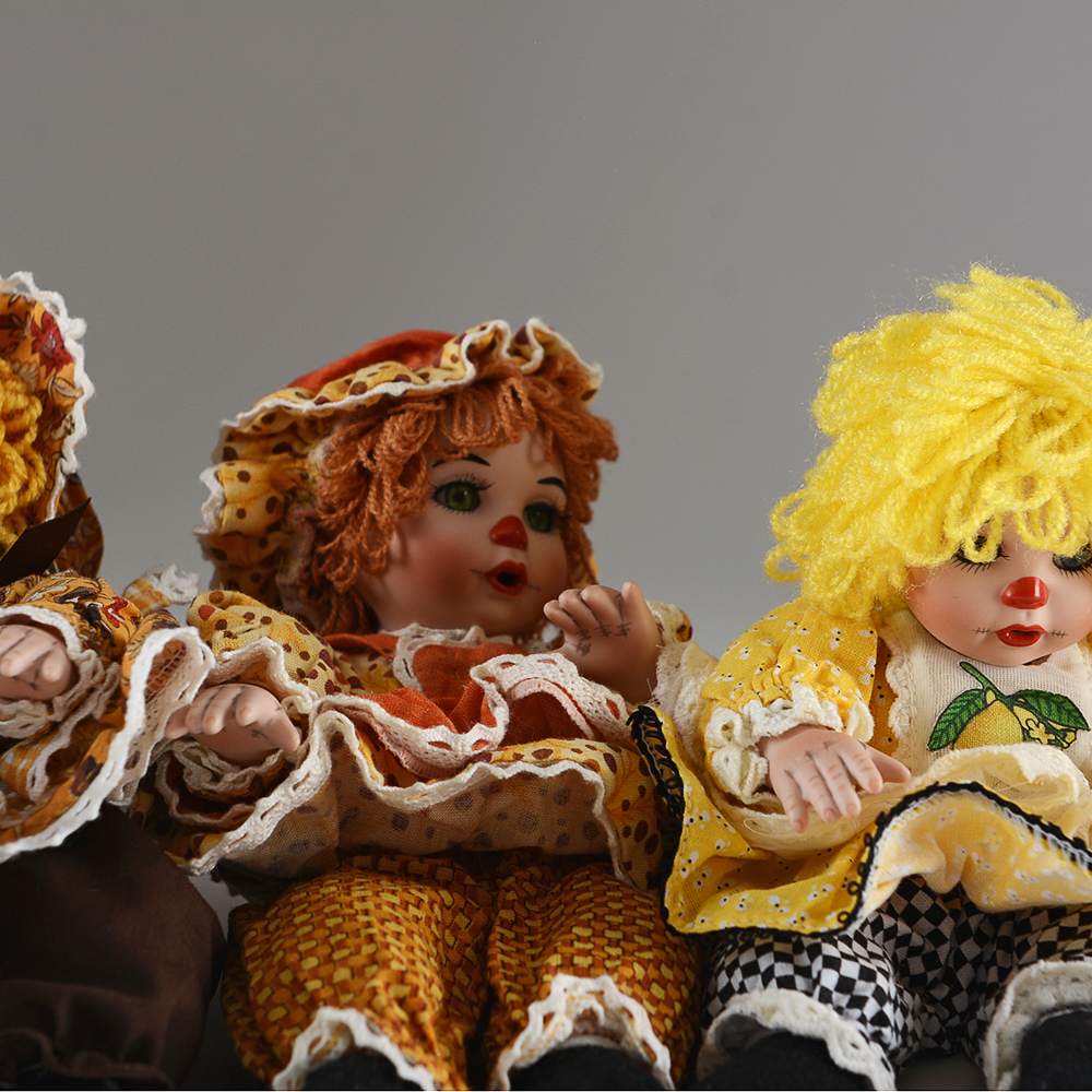 Charisma Brands Porcelain Dolls