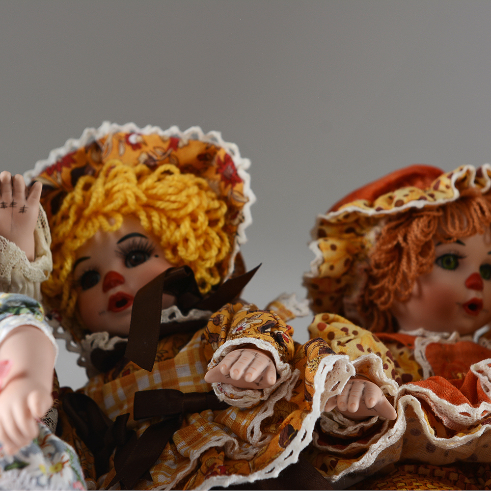 Charisma Brands Porcelain Dolls
