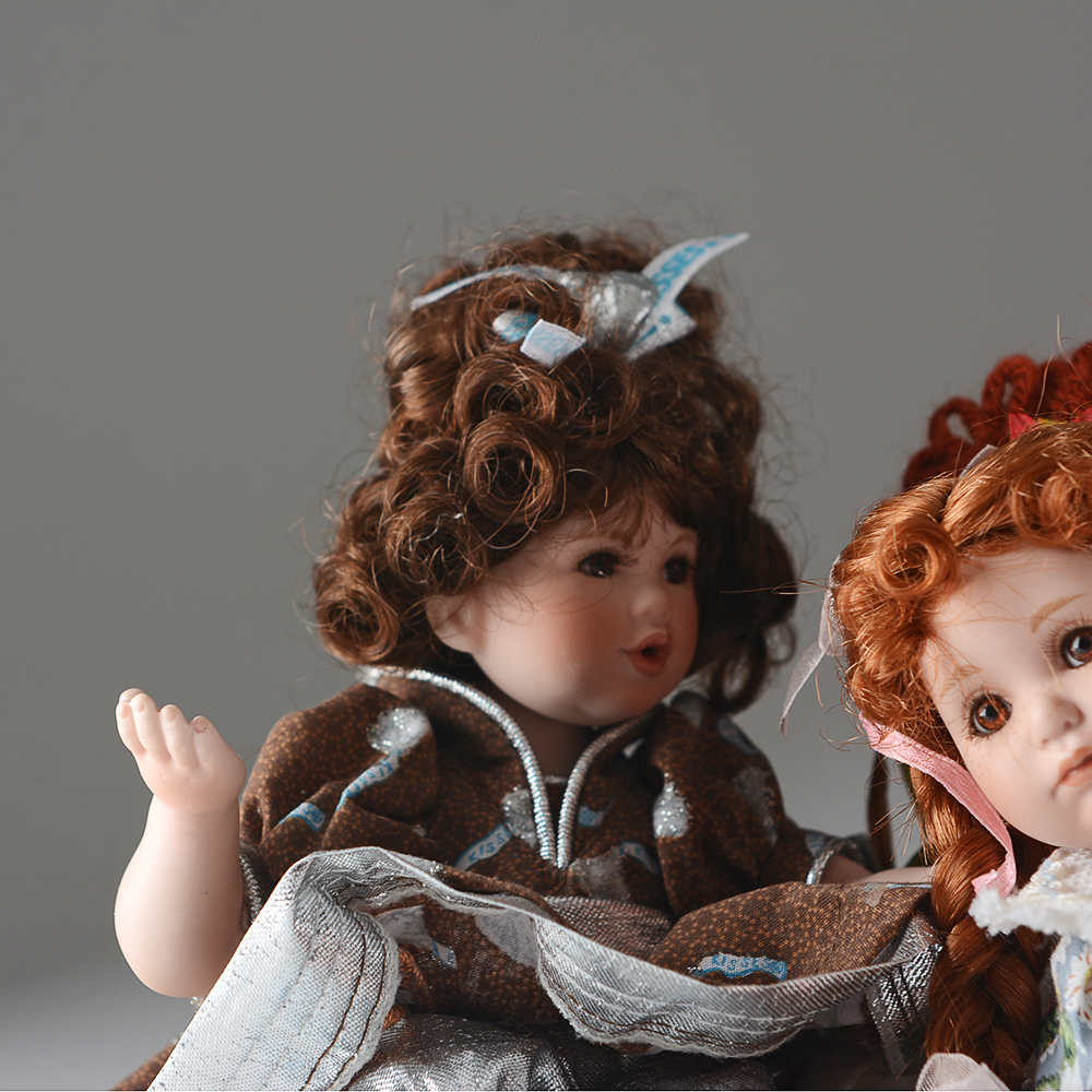 Charisma Brands Porcelain Dolls