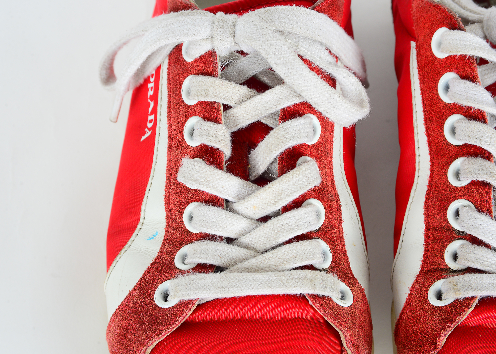 Red Prada Tennis Shoes