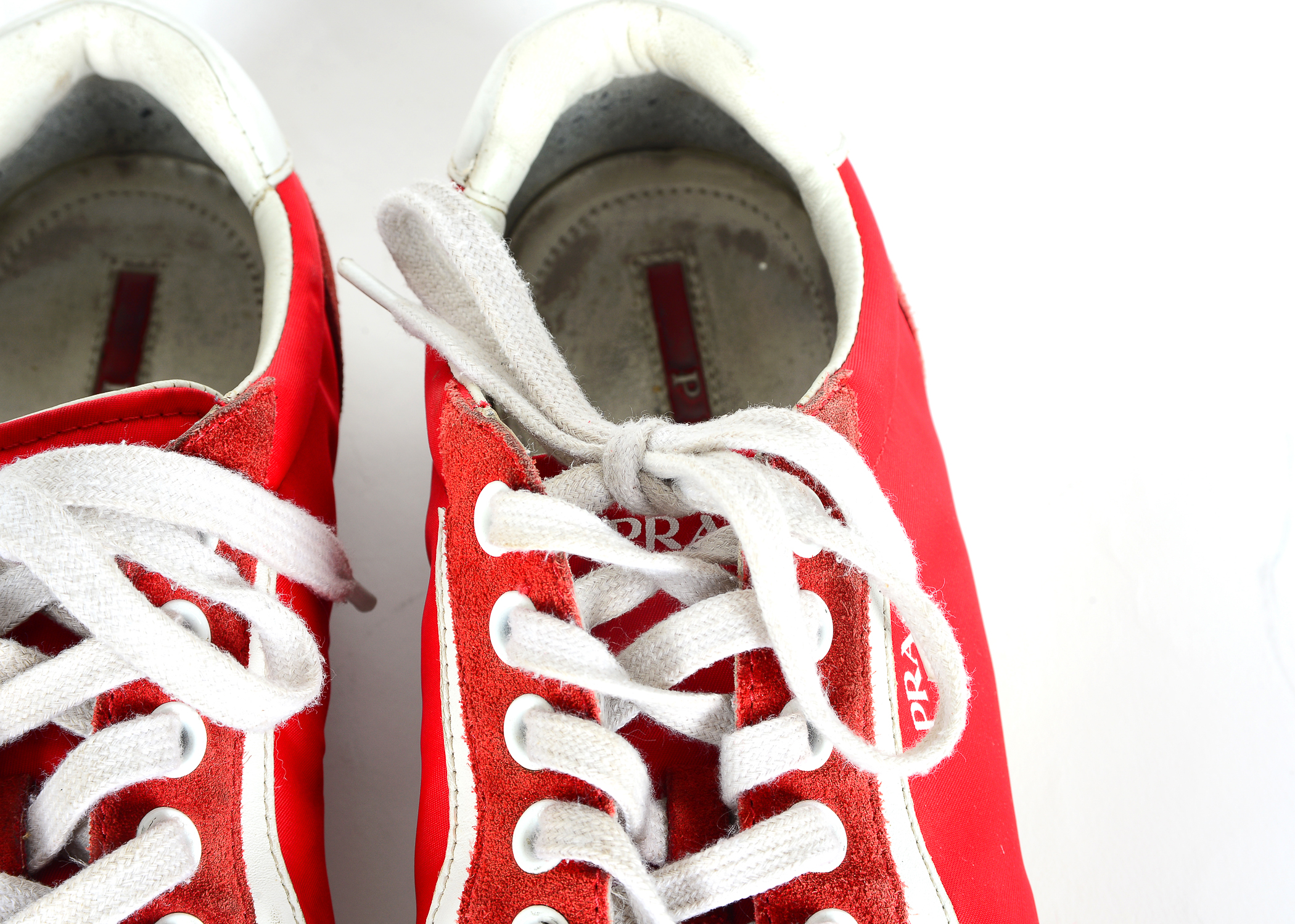 Red Prada Tennis Shoes