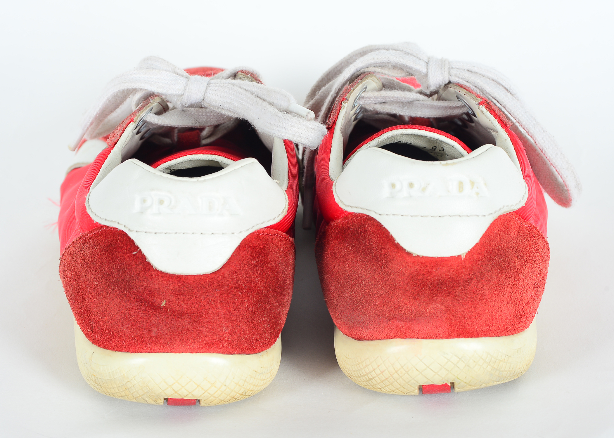 Red Prada Tennis Shoes