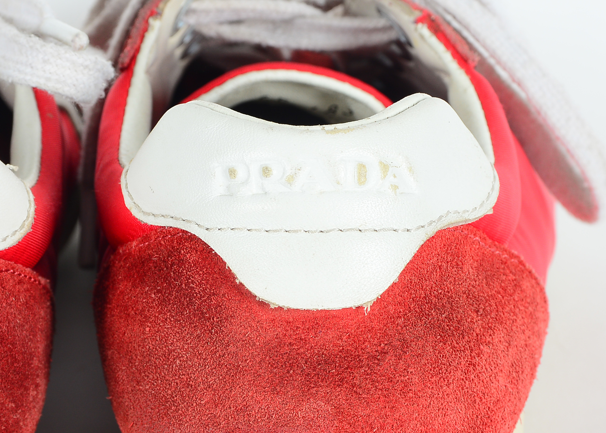 Red Prada Tennis Shoes