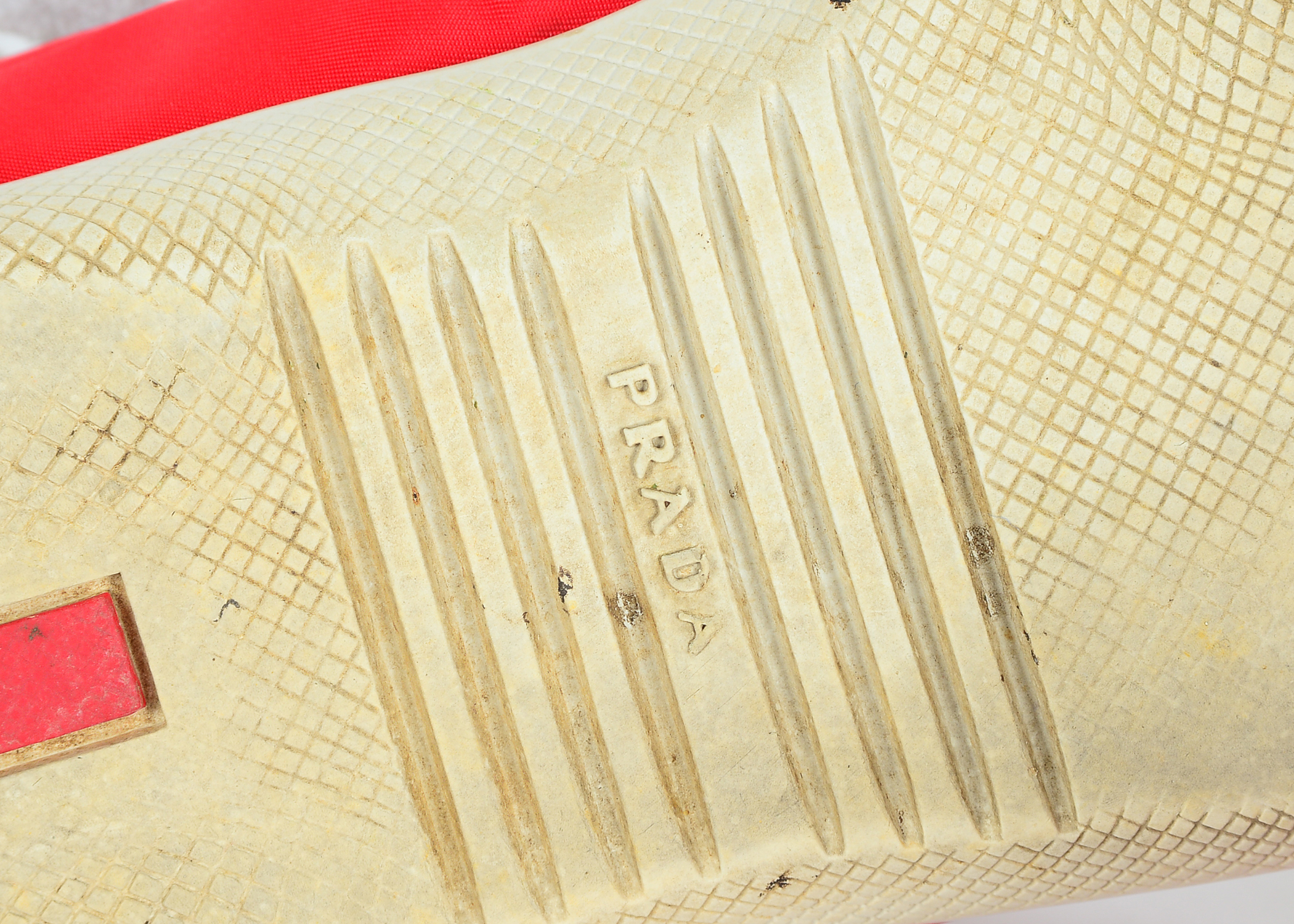 Red Prada Tennis Shoes